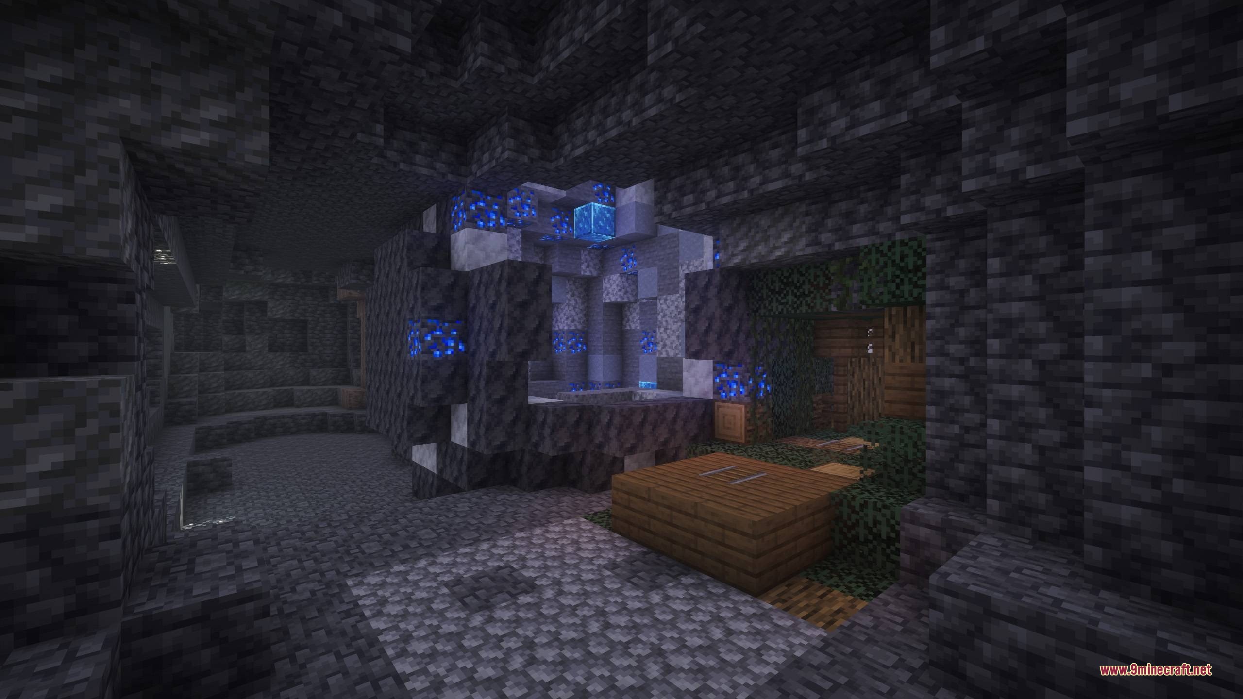 Bm More Geodes Data Pack (1.21.11, 1.21.1) – Mine Hidden Pockets Of Valuable 2 A glowing blue ore geode discovered inside a dark deepslate cave system