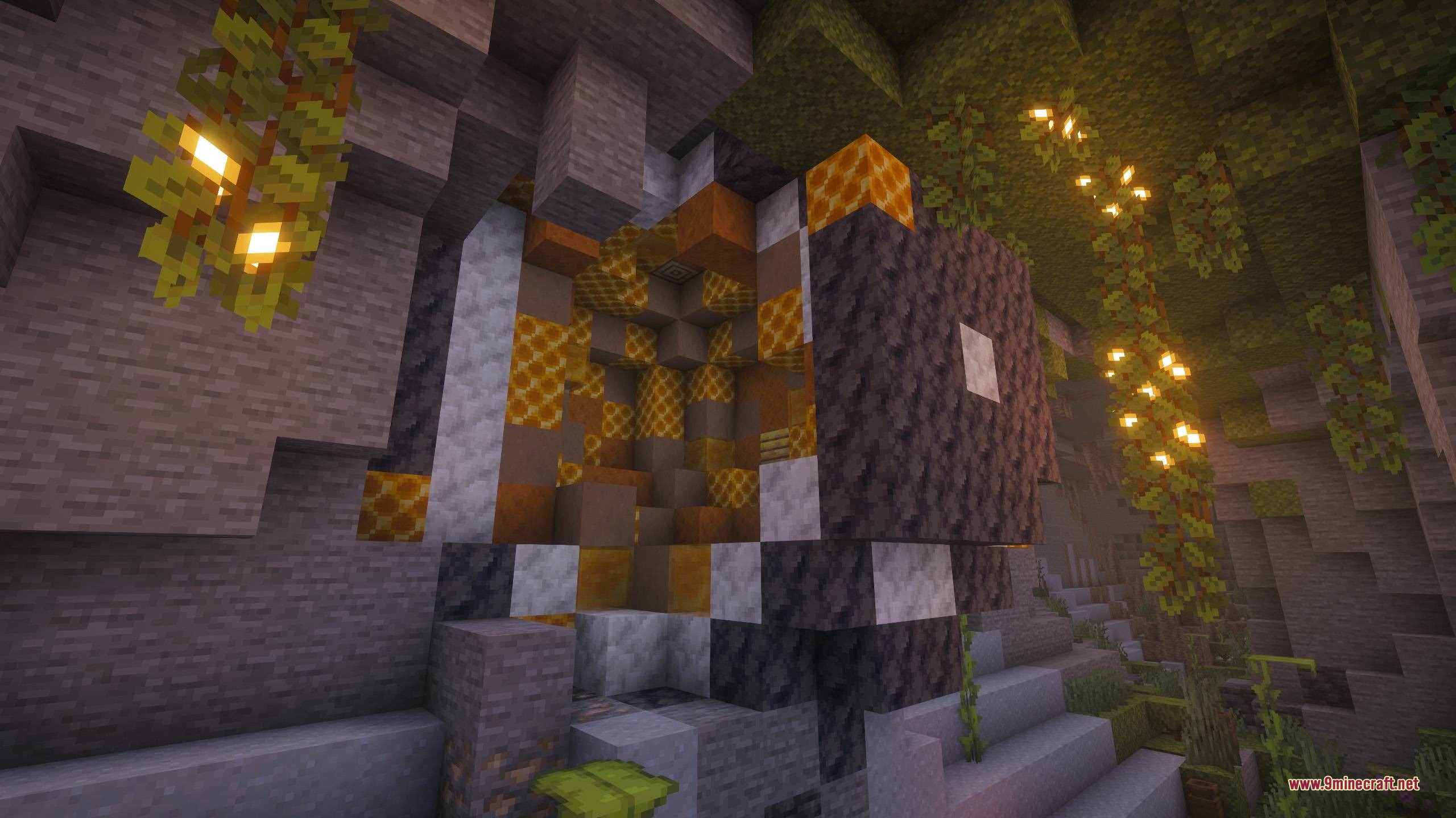 Bm More Geodes Data Pack (1.21.11, 1.21.1) – Mine Hidden Pockets Of Valuable 4 A honey geode surrounded by stone and glowing vines in a cave