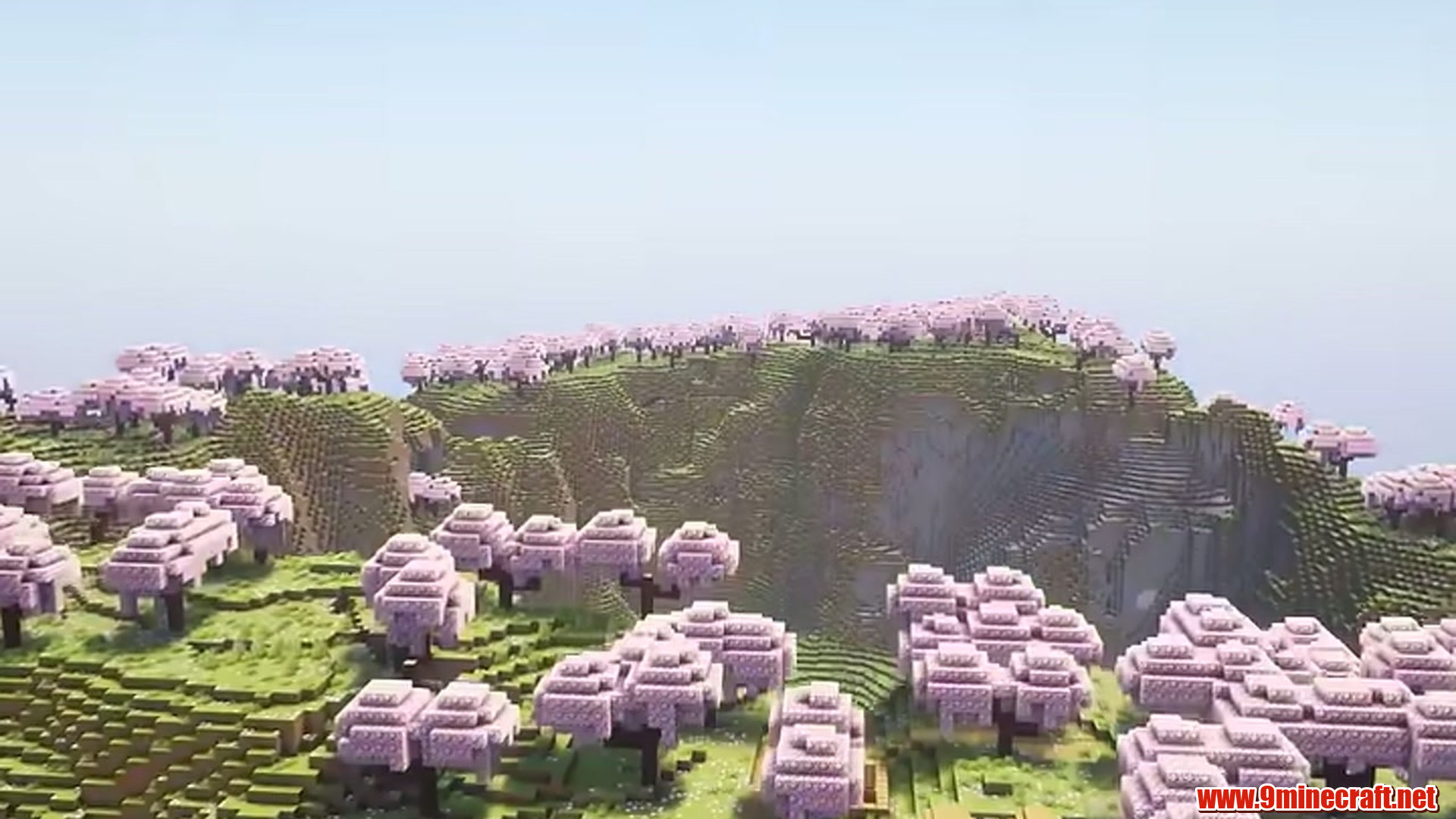 Best Seeds For Minecraft (26.2, 1.21.11) Part 11 – Java/Bedrock Edition 3 Second landscape view of cherry village ridge
