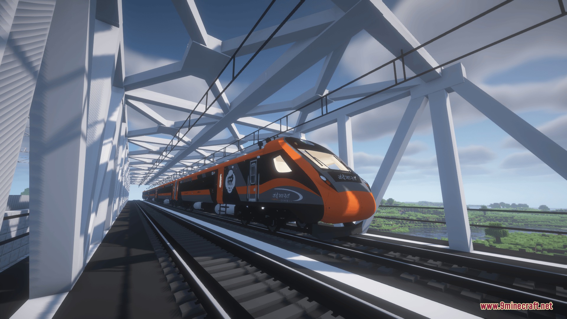 Sleek orange train crossing a white truss bridge with overhead electrical wires