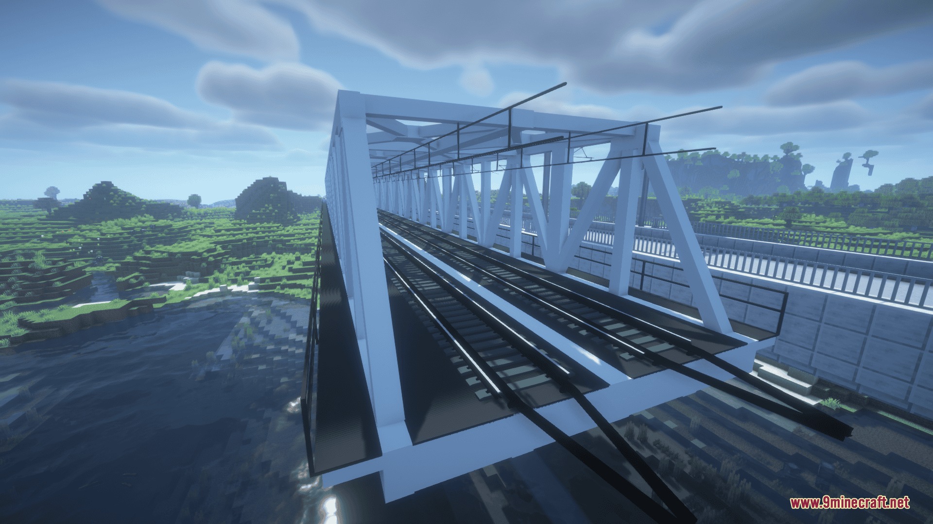Detailed white metal truss bridge with overhead electrical wires over a river
