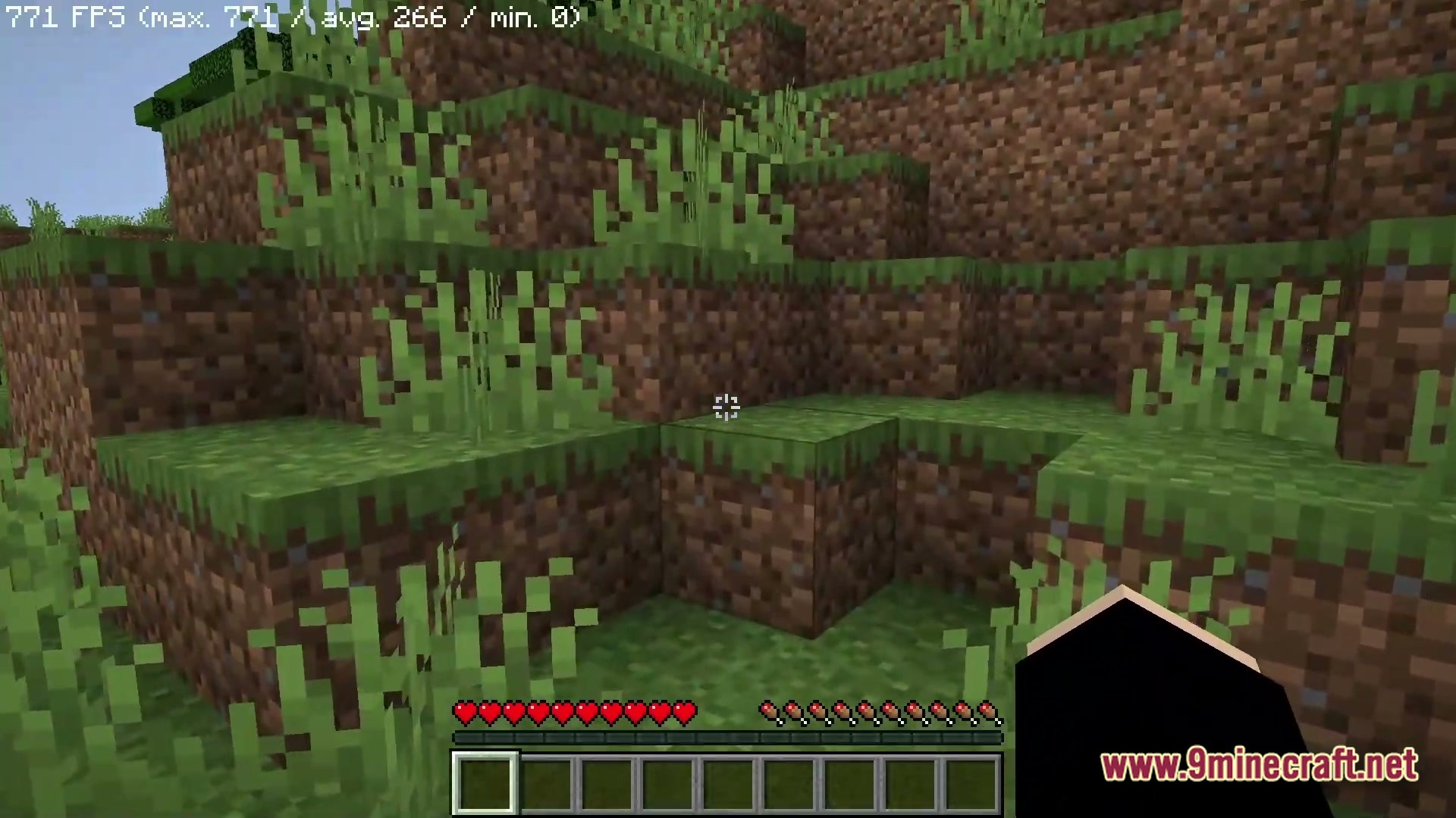 Boosted Fps Performance Optimized Modpack (1.20.1) – Supercharge Your Game Speed 7 A first-person view of a grassy hillside in minecraft with a high frame rate counter displayed