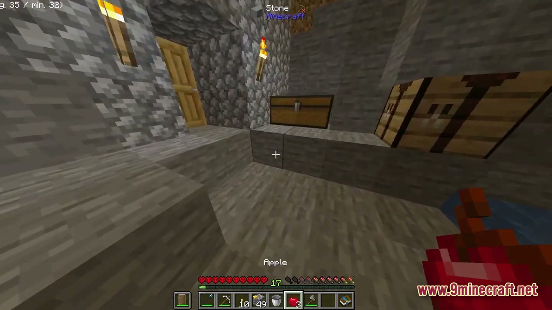 Boundless Tale Odyssey Modpack (1.20.1) – Giant Questing And Tech Adventure 6 A player stands in a stone underground base featuring a chest, torches, and crafting tables