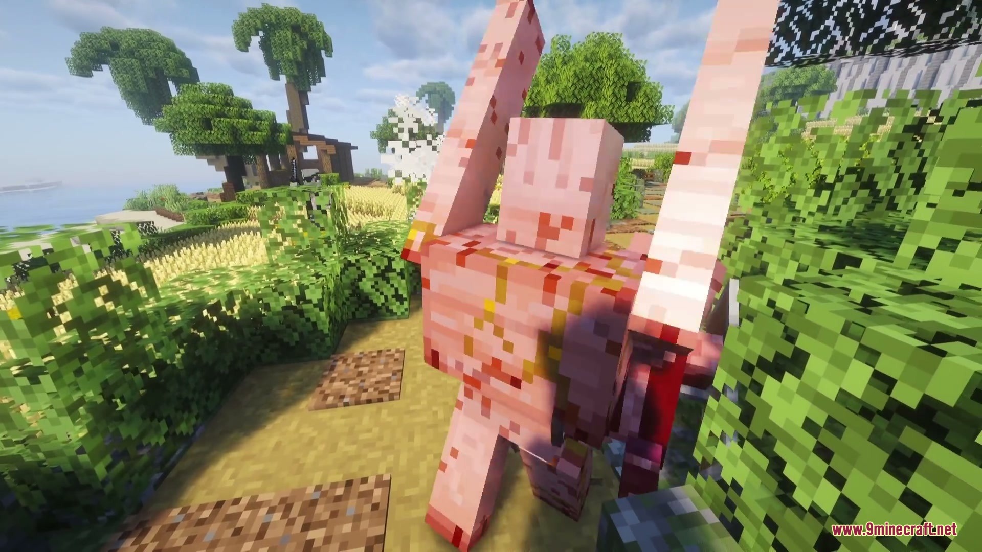 Brewbound Outcast Mod (1.20.1) – Battle Dangerous Illager Bosses In Your World 2 A large pink mutant creature stands amidst green bushes and trees