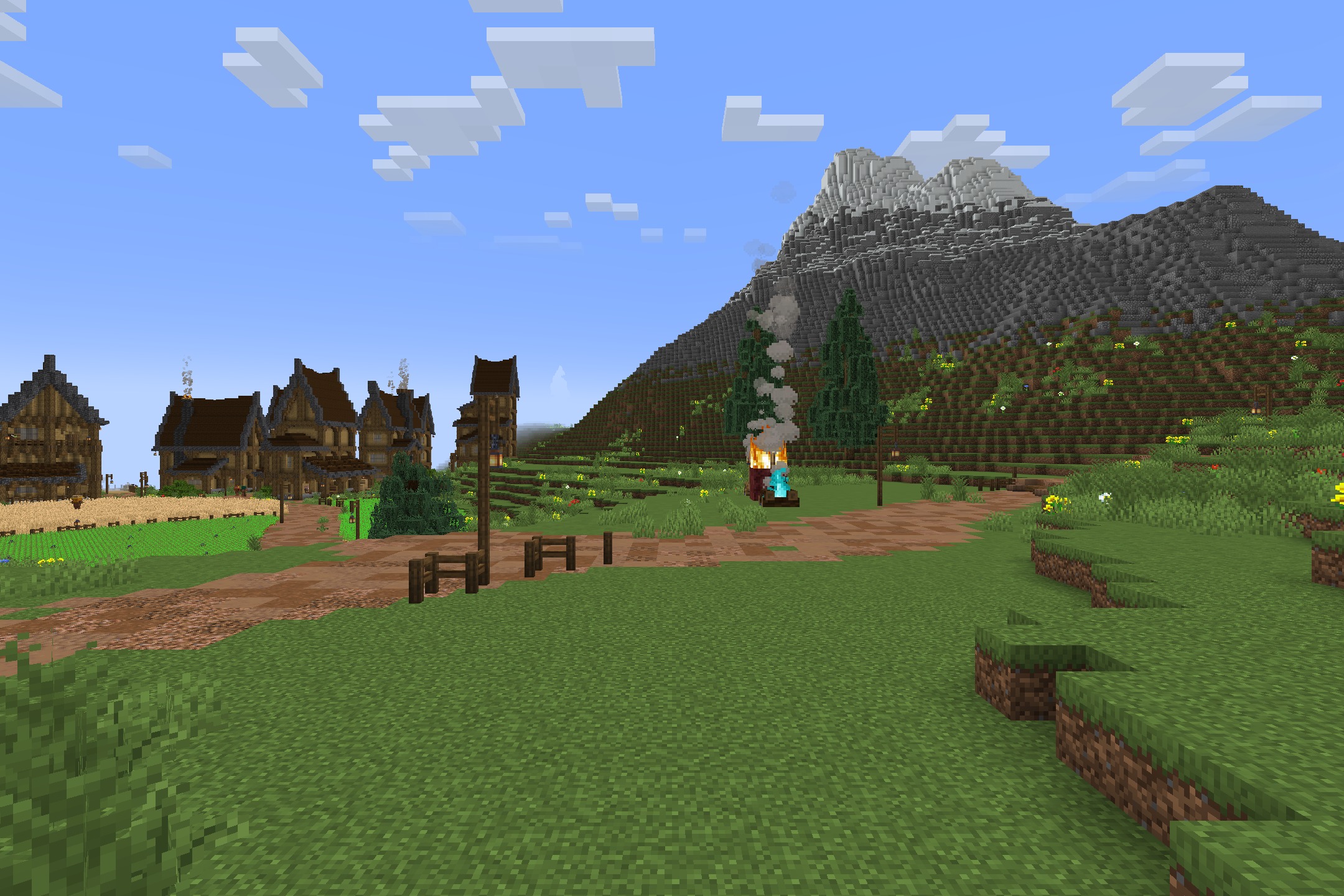 Bww Resource Pack (1.16.5) – Cozy Rustic Textures For Medieval Villages 2 Rustic medieval village with a dirt path and campfire near a snowy mountain