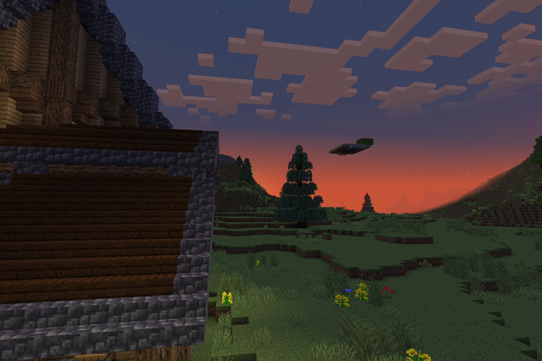 Bww Resource Pack (1.16.5) – Cozy Rustic Textures For Medieval Villages 11 Rustic building overlooking a grassy field with pine trees under a colorful sky