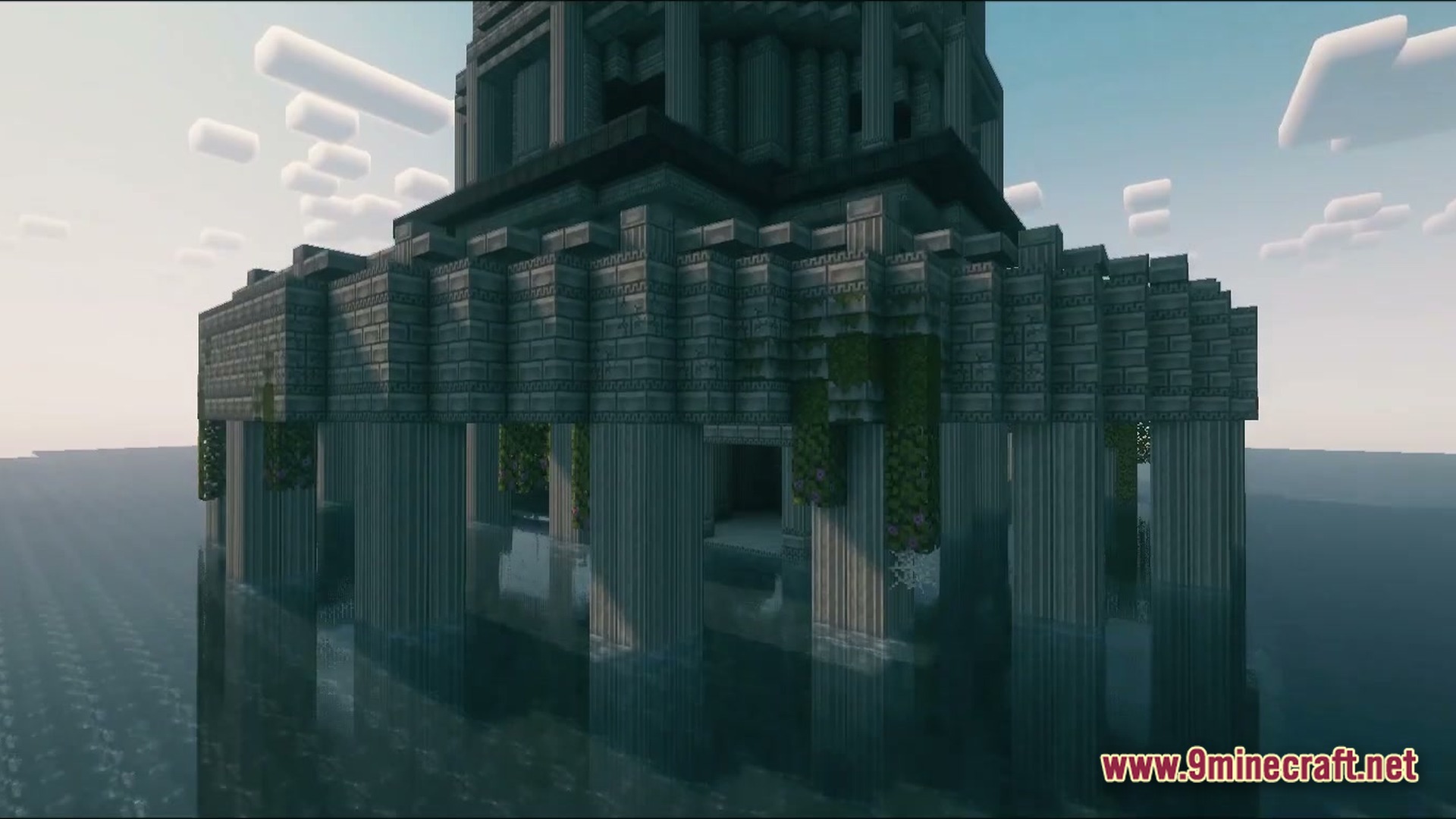 A large stone temple structure with pillars and hanging vines sits atop an ocean biome