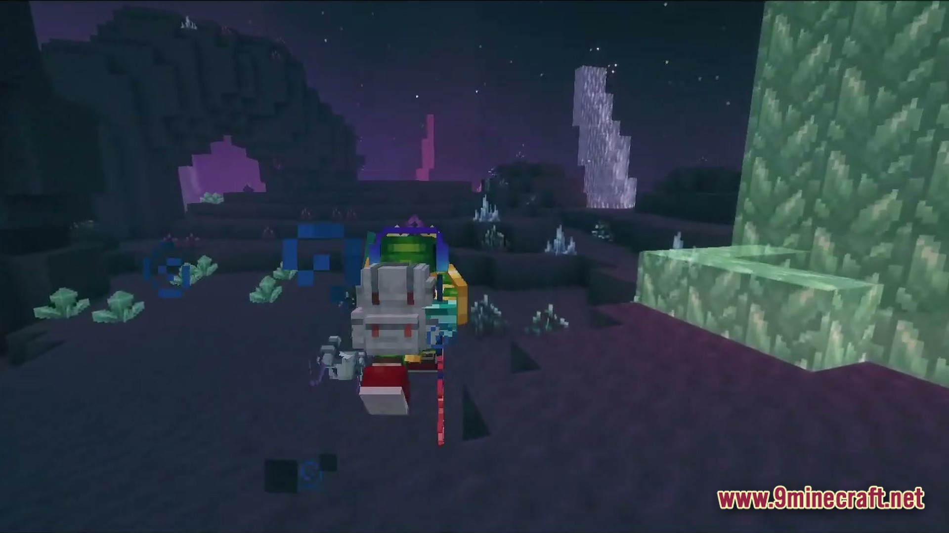 A player wearing a backpack explores a dark alien biome with glowing crystals and structures