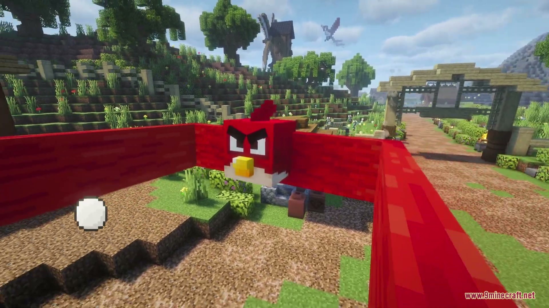 Citrus Wings Mod (1.21.1) – Launch Powerful Birds To Demolish Custom Towers 4 A red bird character being launched from a large slingshot in minecraft