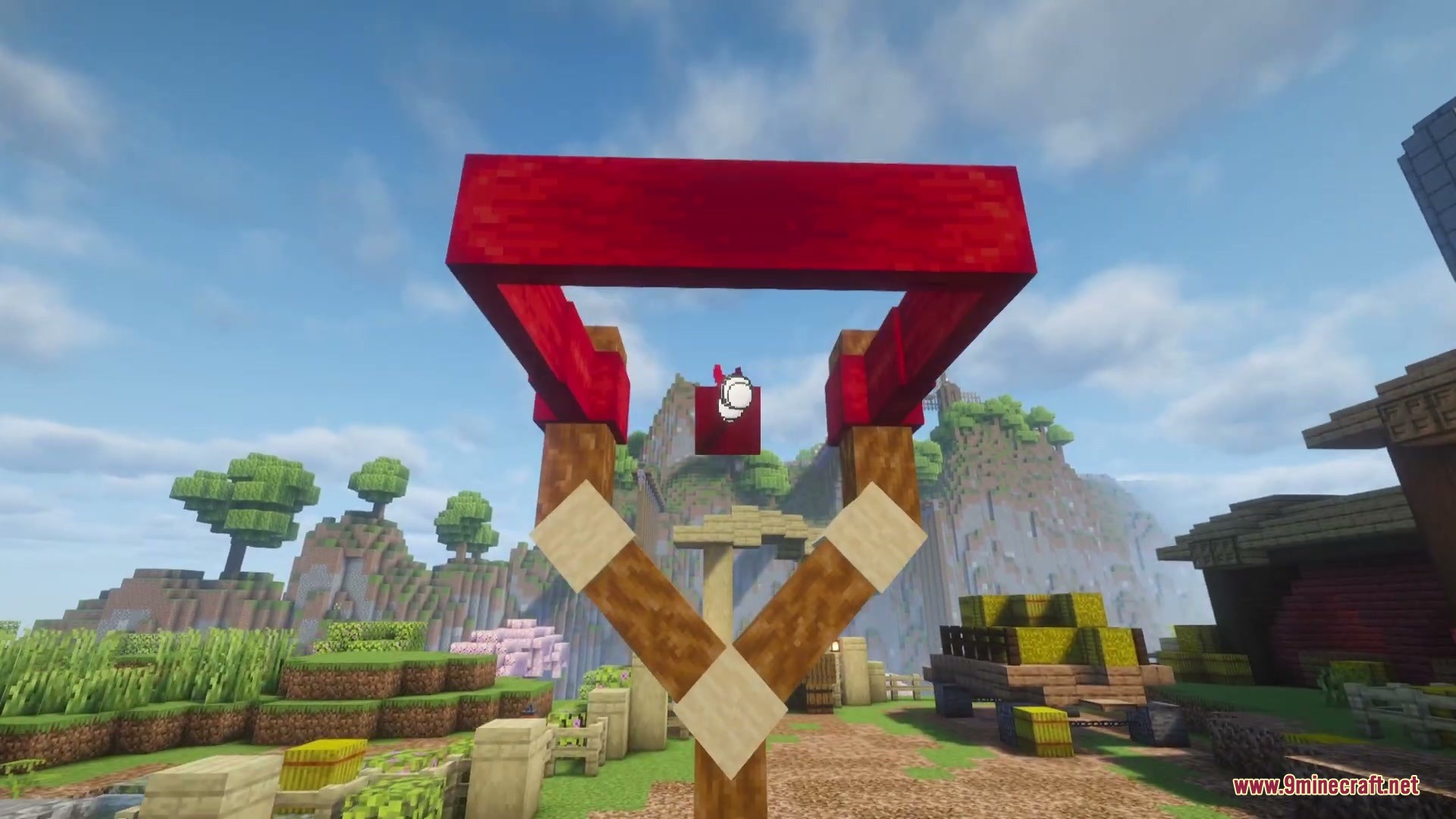 Citrus Wings Mod (1.21.1) – Launch Powerful Birds To Demolish Custom Towers 6 Launching a red bird from a giant slingshot in the citrus wings mod