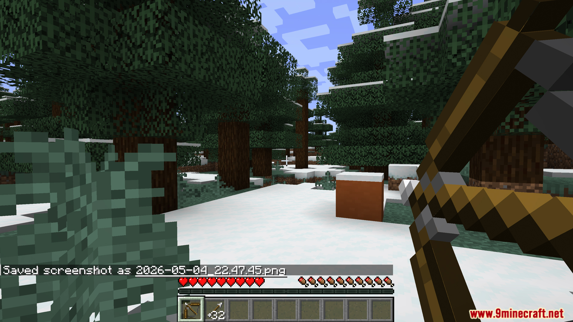 Player holding a bow in a snowy taiga forest