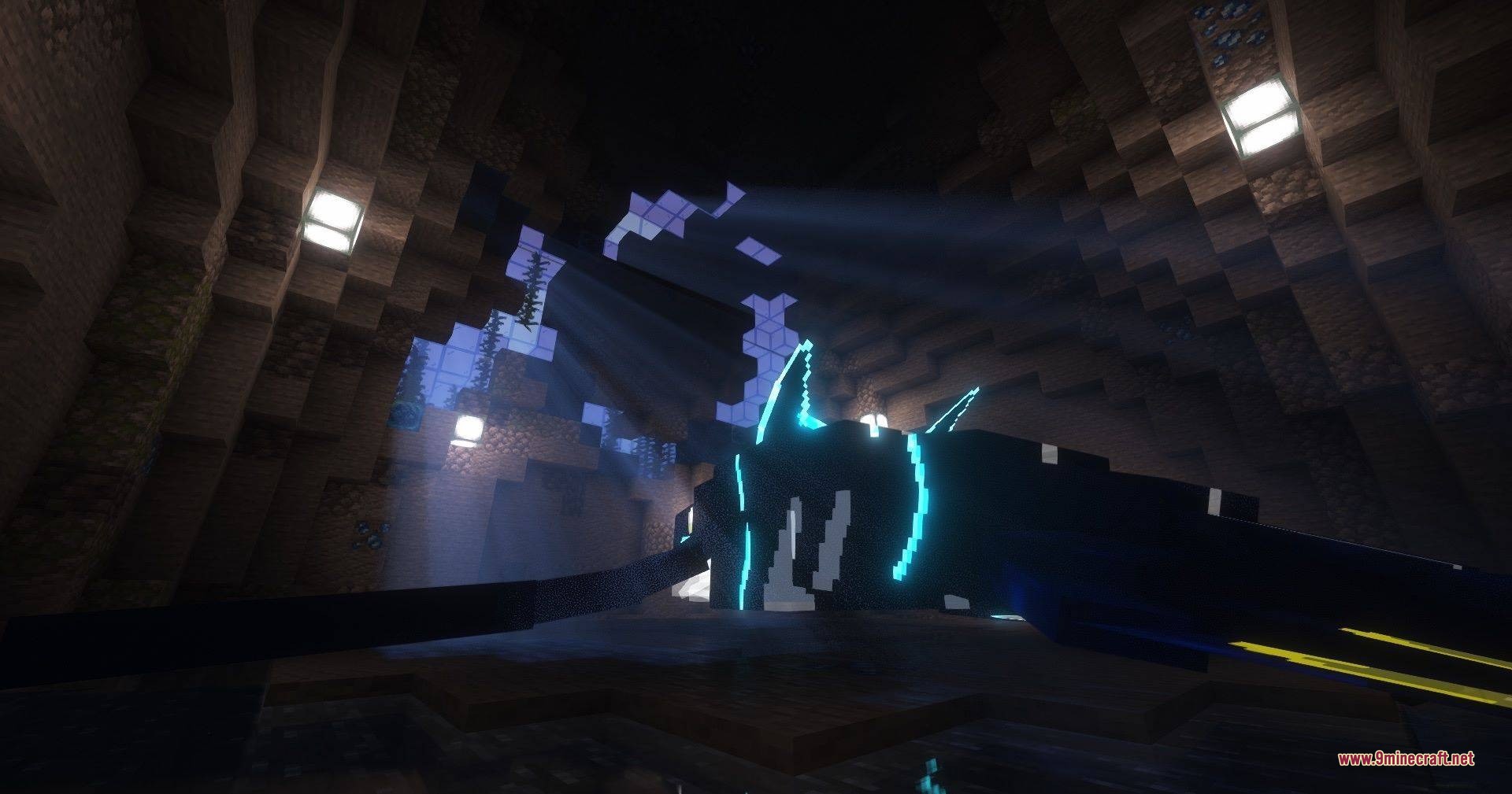 Primal kyogre rests inside a dark cave with light rays shining through