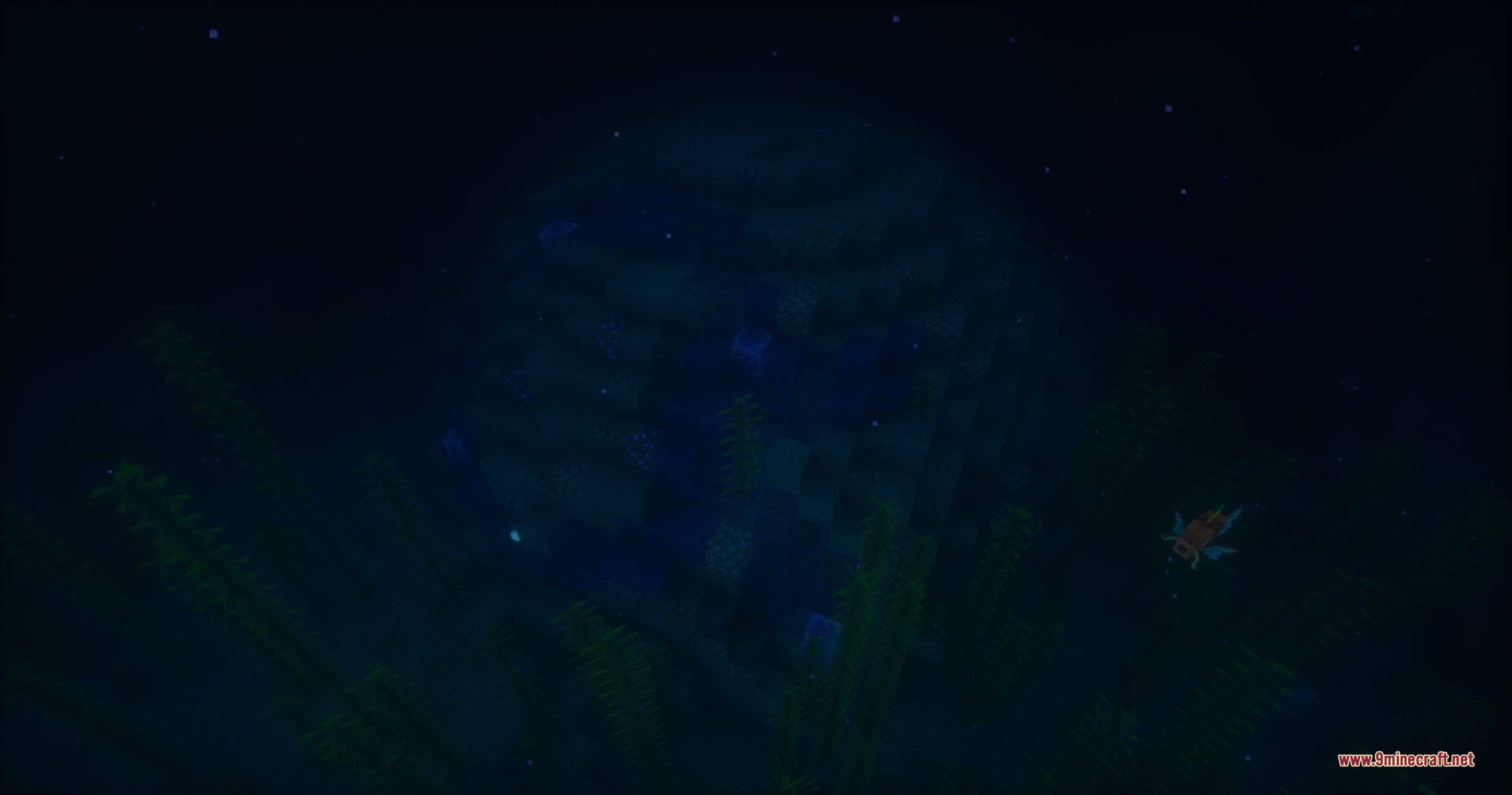 A mysterious spherical structure hidden deep underwater among kelp and sea plants