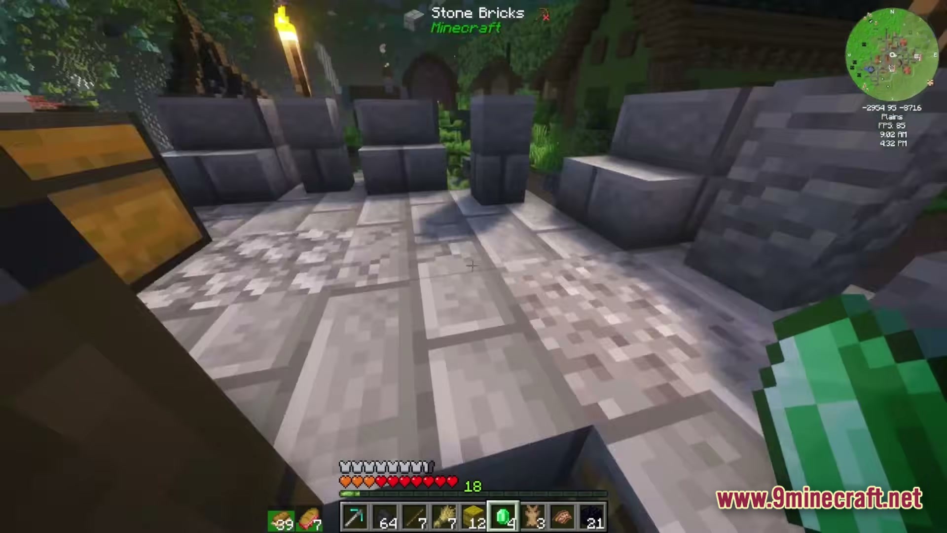 Create Above The Horizon Modpack (1.21.1) – Fly Airships Across Upgraded Lands 7 A player holds an emerald while standing on a stone brick path near a wooden chest