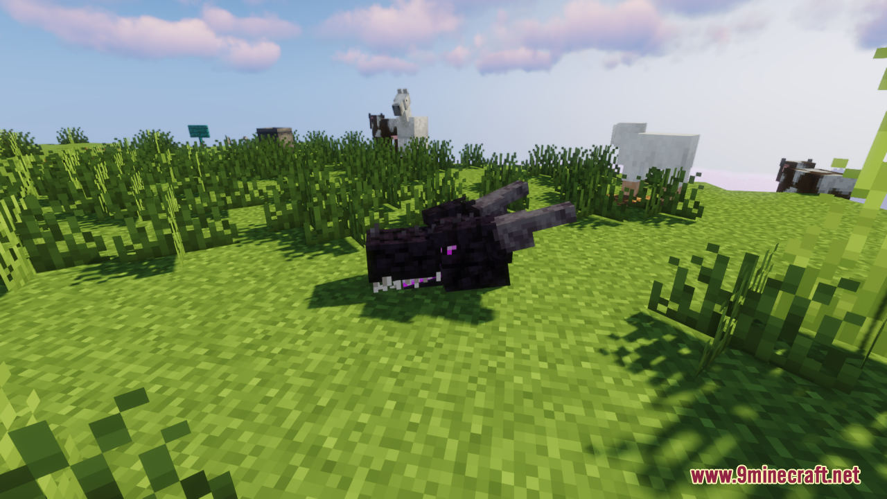Ender Dragon Reborn Resource Pack (26.2, 1.20.1) – A Terrifying Wyvern Boss 6 A detailed wyvern style dragon head resting on the grass in minecraft