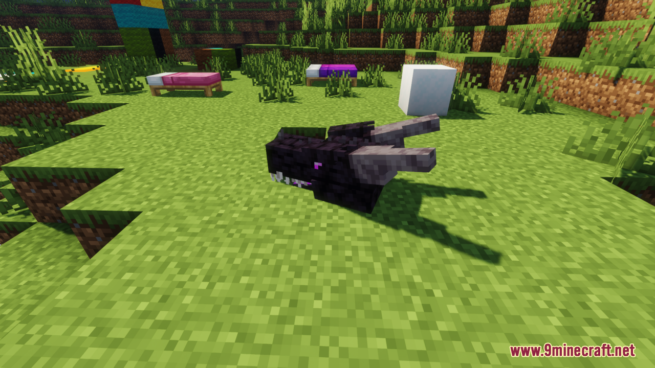 Ender Dragon Reborn Resource Pack (26.2, 1.20.1) – A Terrifying Wyvern Boss 10 A black dragon head with horns sitting on a green grass field