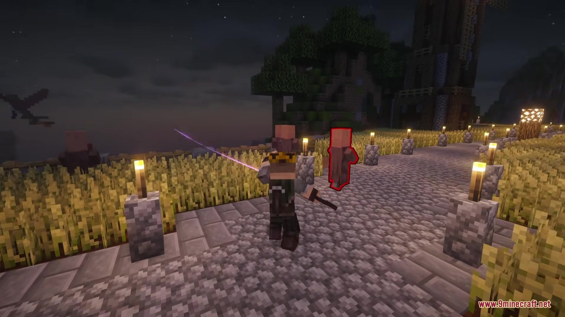 Player targeting a villager with a glowing purple sword trail at night