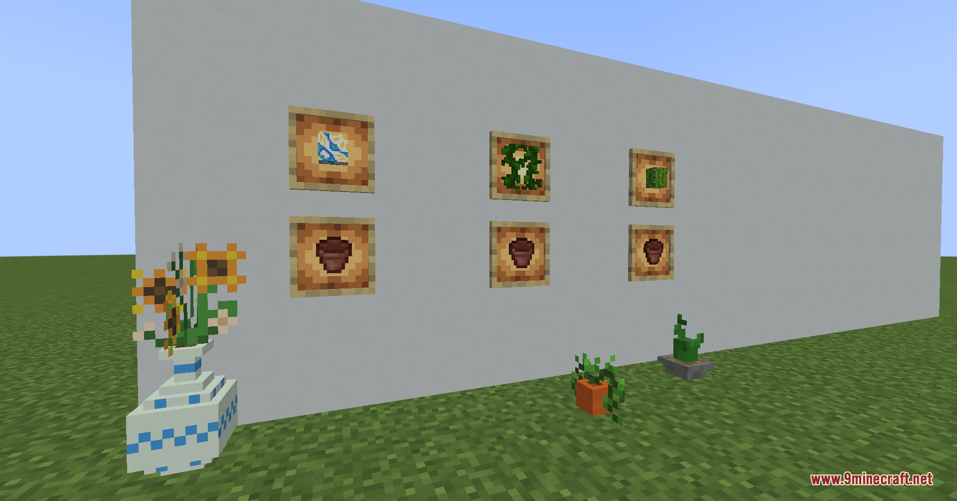 Fay’s Plants Mod (1.20.1) – Design Cozy Indoor Gardens With Cute Animal Pots 8 Blue and white vase with sunflowers next to a white wall