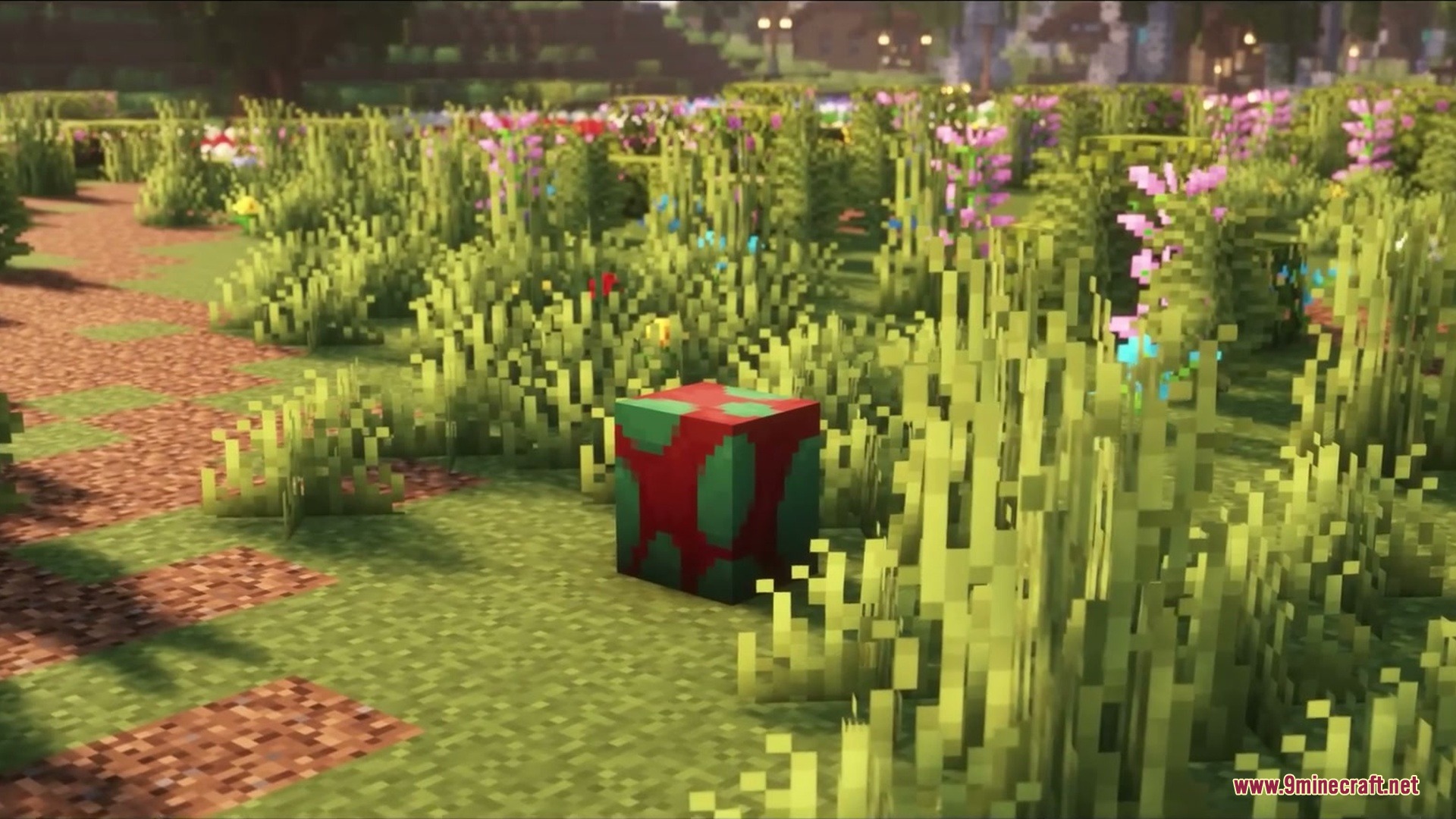 A sniffer egg sits in a field of tall grass and vibrant flowers