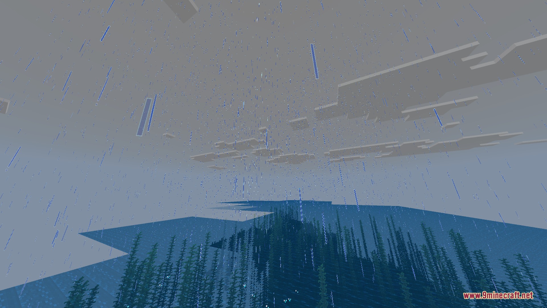Rain falling on the ocean surface with underwater vegetation visible below
