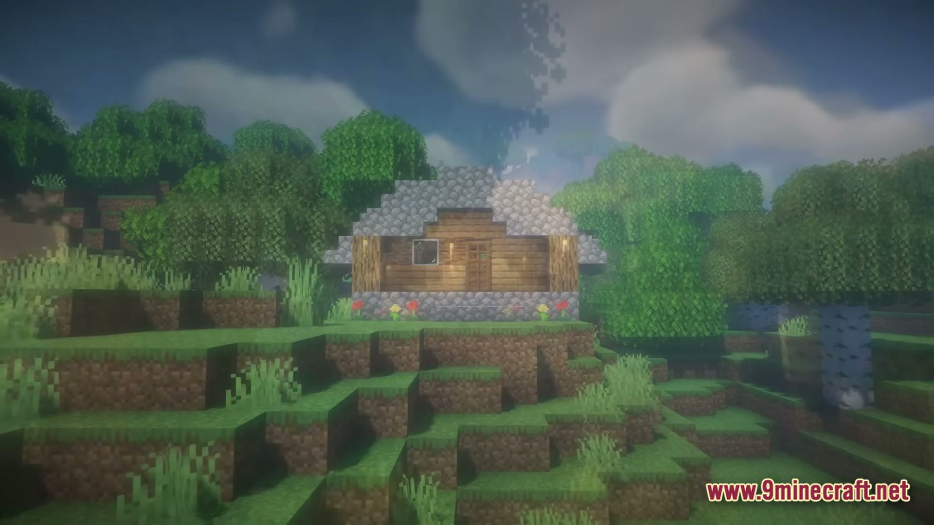 From The Fog Modpack (1.20.1) – Survive The Creepy Stalker 5 A small cobblestone and wood house sits on a grassy hill surrounded by dense green trees