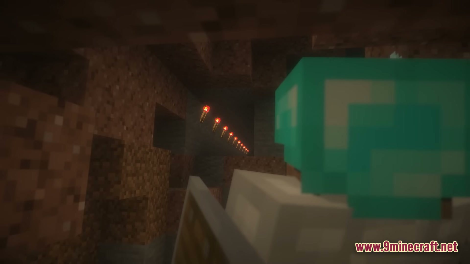 From The Fog Modpack (1.20.1) – Survive The Creepy Stalker 7 A player in diamond armor looks at a trail of redstone torches inside a dark cave