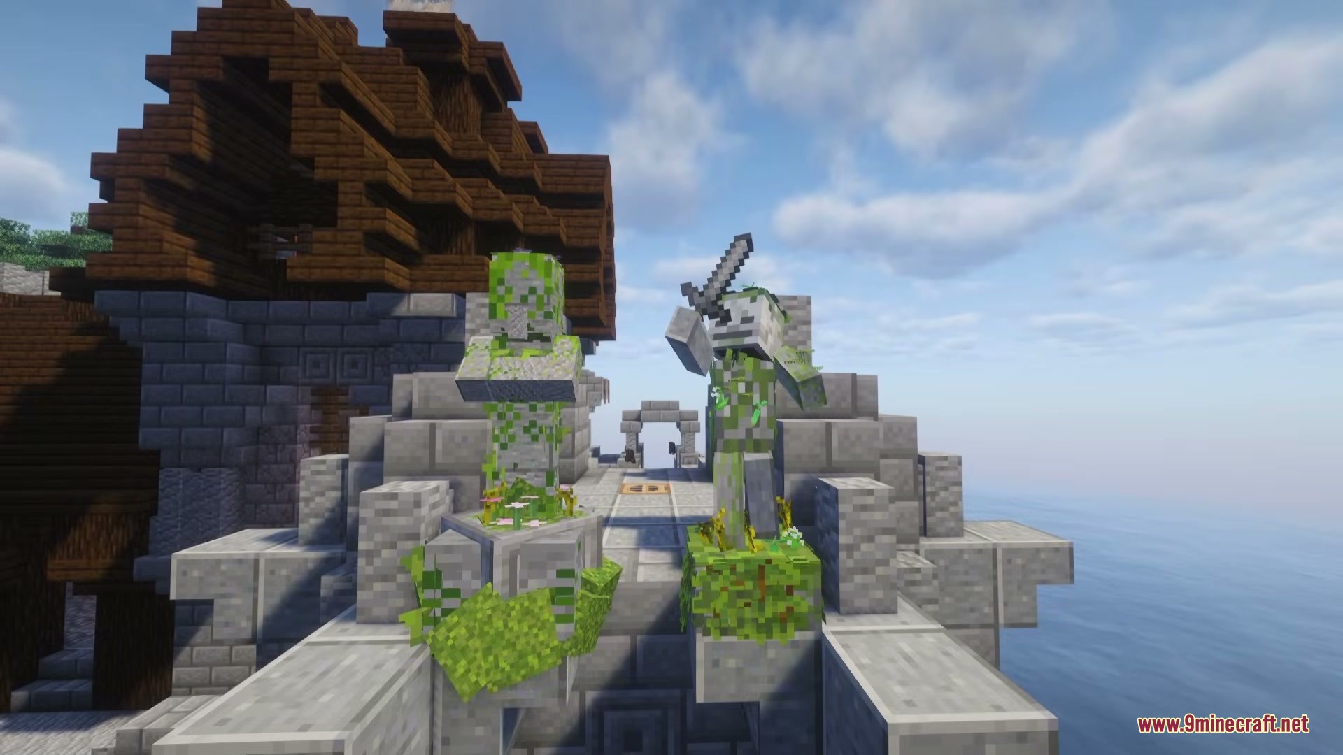 Functional Statues Mod (26.2, 1.20.1) – Craft Custom Stone Statues 2 Mossy stone statues of a villager and a skeleton on a stone bridge