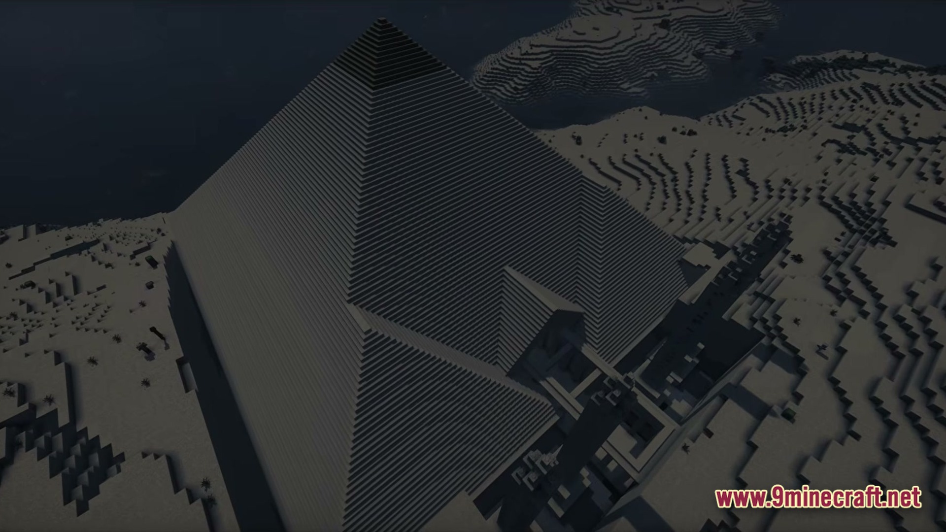 Immersive Experience Modpack (26.1) – Lifelike Visuals And Fresh Audio 5 An aerial view of a massive stone pyramid structure situated within a desert biome at night