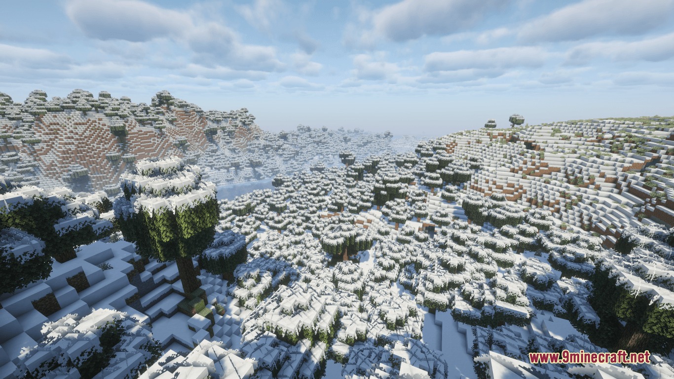 Immersive Snowy Leaves Bushy Leaves Resource Pack (1.21.11, 1.20.1) 5 Bright snowy landscape with bushy trees and hills under a cloudy blue sky