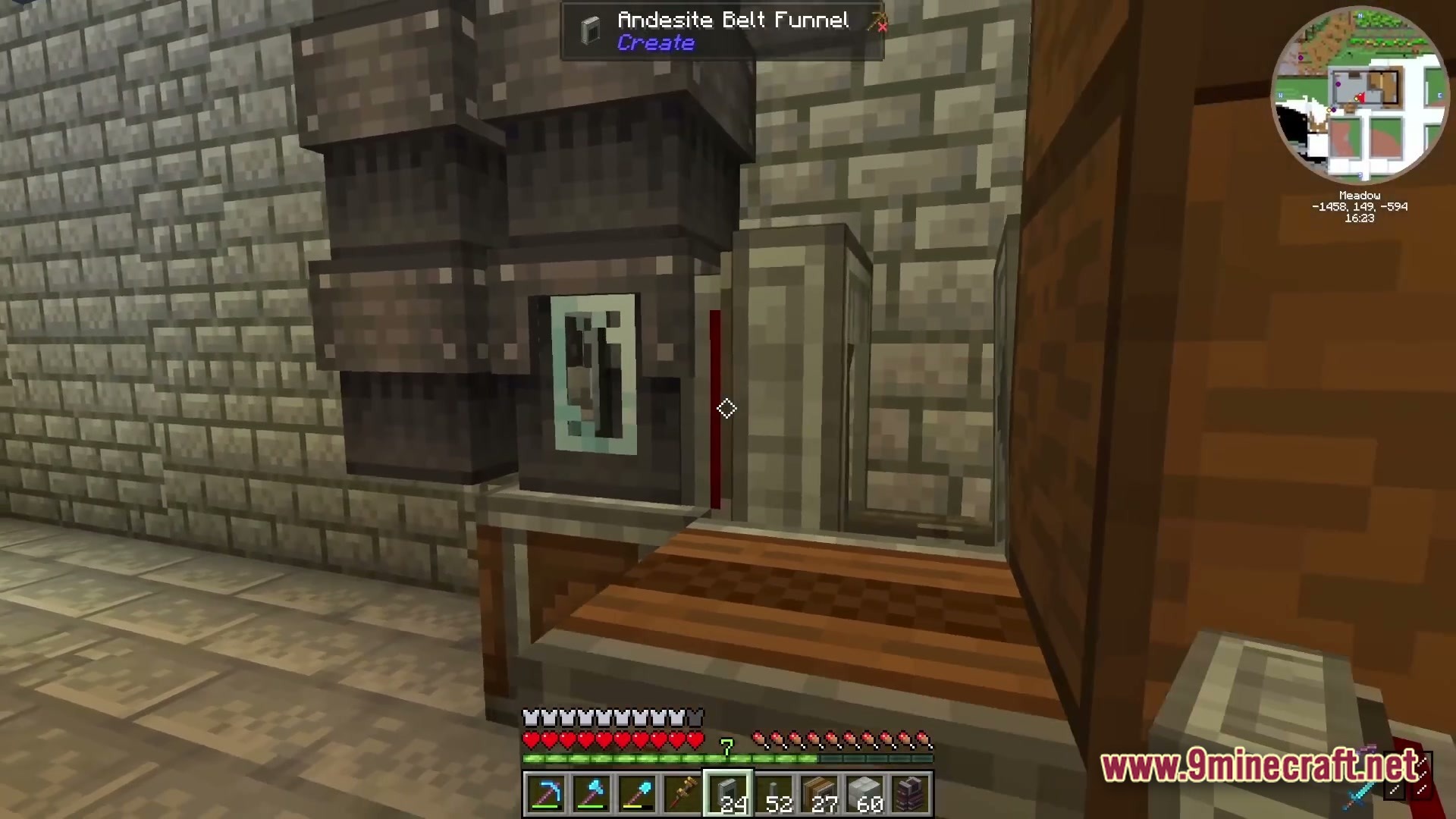 Industrial Banquet Crucible Modpack (1.20.1) – Automate Cooking And Gear Technology 3 An andesite belt funnel from the create mod positioned above a wooden mechanical belt system