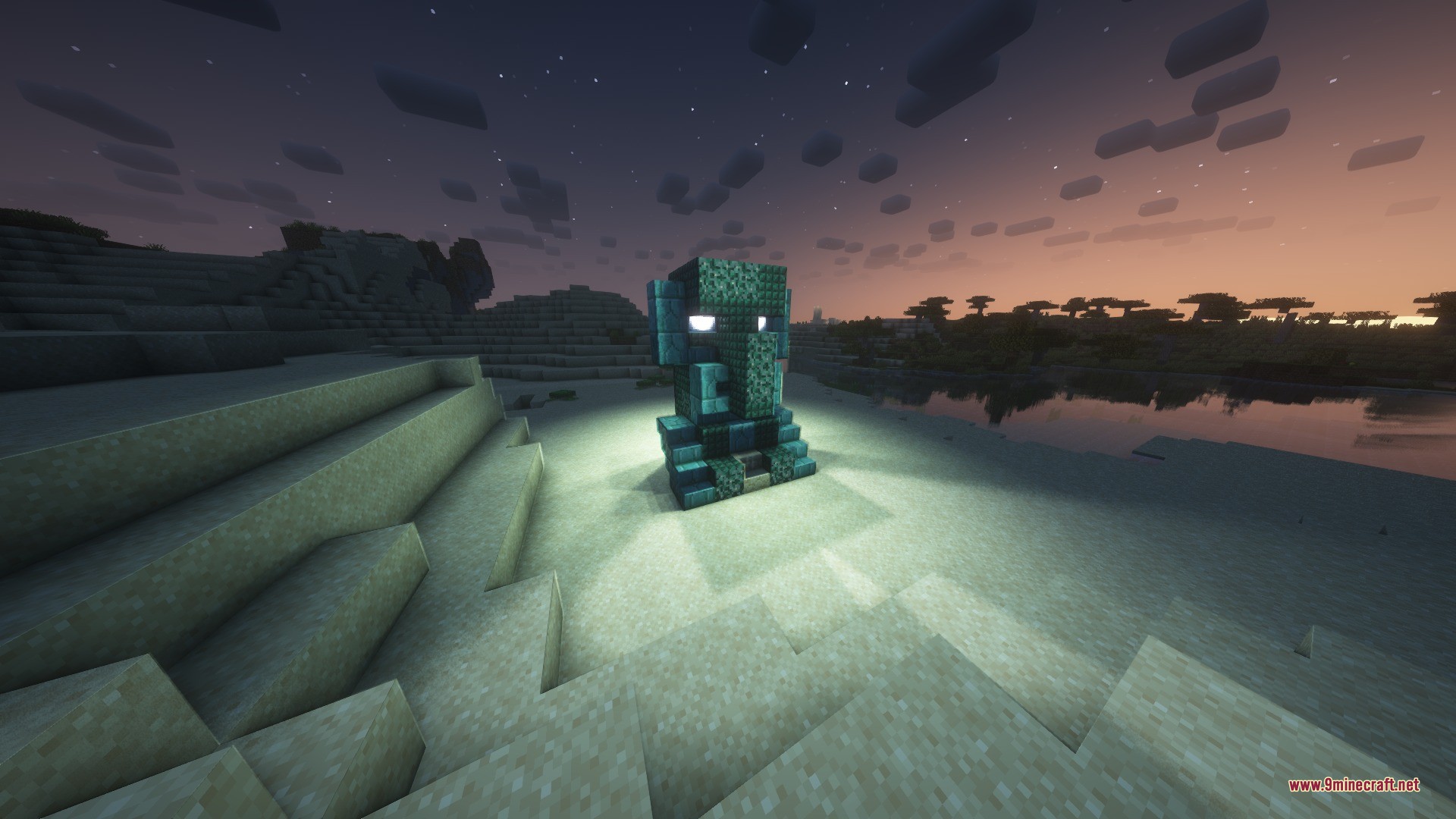 A giant villager statue made of copper blocks stands in the desert