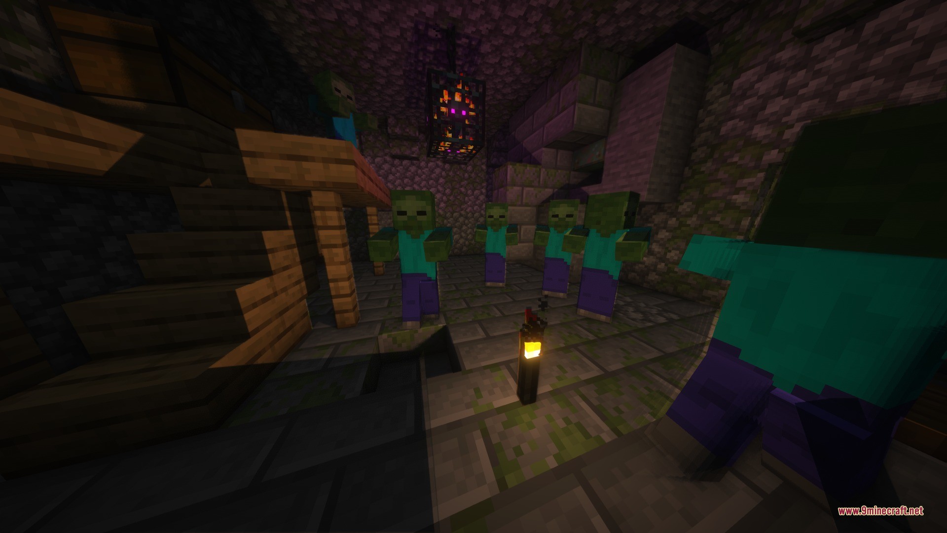 Zombies gather around a monster spawner inside a dark underground dungeon