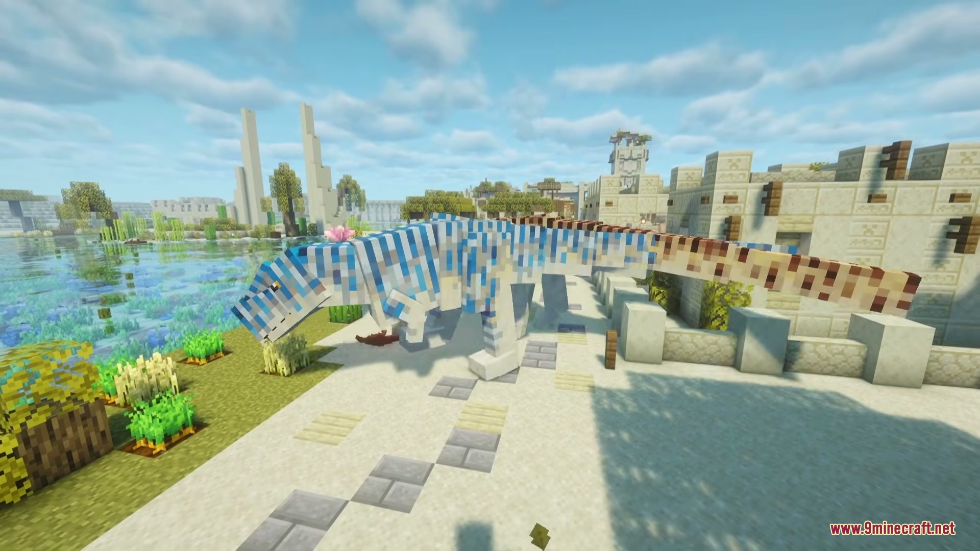 A large blue striped dinosaur with a pink flower stands in a village