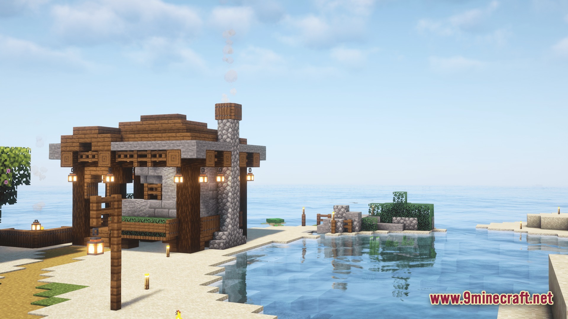 A small wooden and stone house with a smoking chimney sits on a sandy beach