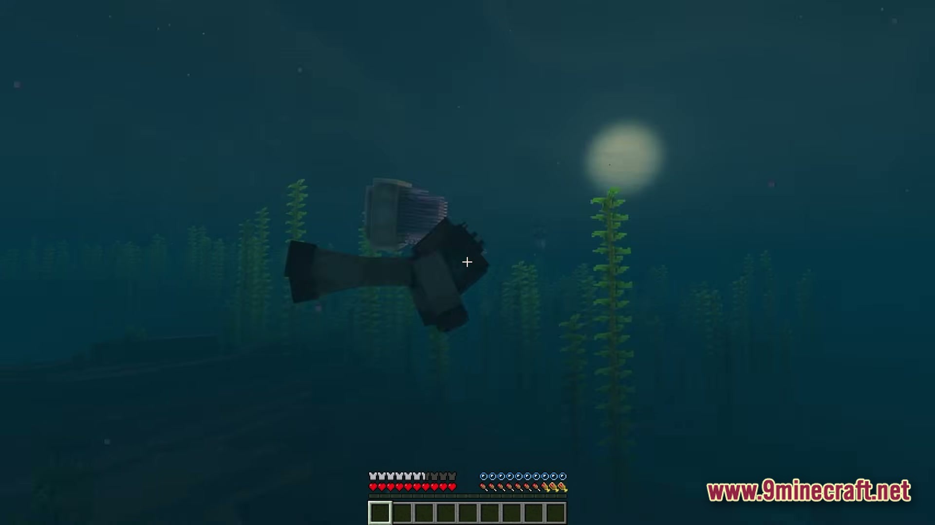 A player character swims through a dark ocean biome filled with tall kelp and aquatic life