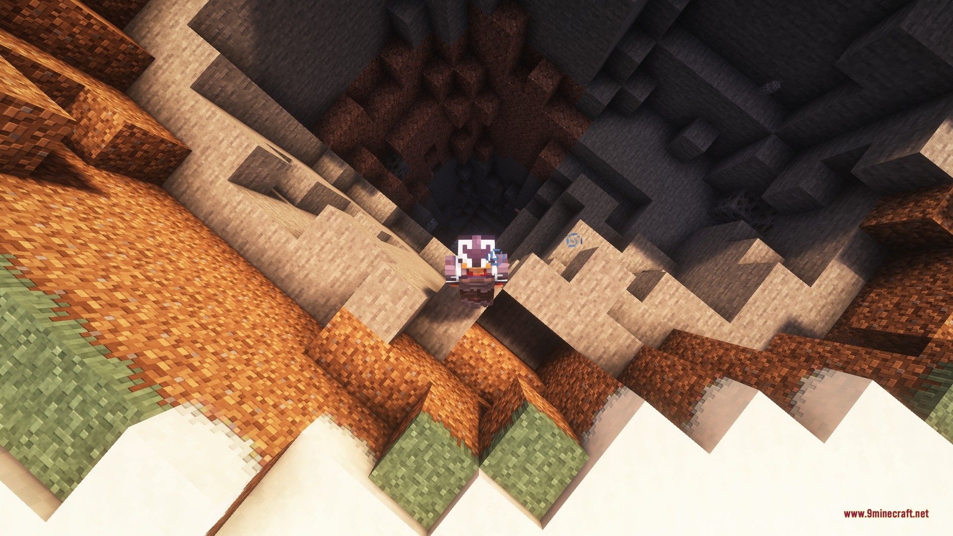 A player looks down into a deep crater formed by a powerful explosion