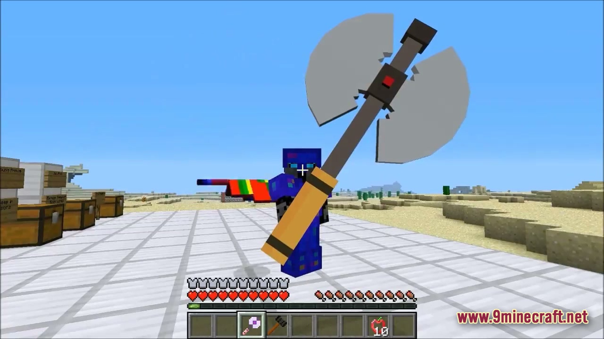 Ore Spawn Adventuree Modpack (1.20.1) – Crazy Dimensions And Giant Beasts 2 A player character in blue armor holds a large double-headed battle axe in a desert biome