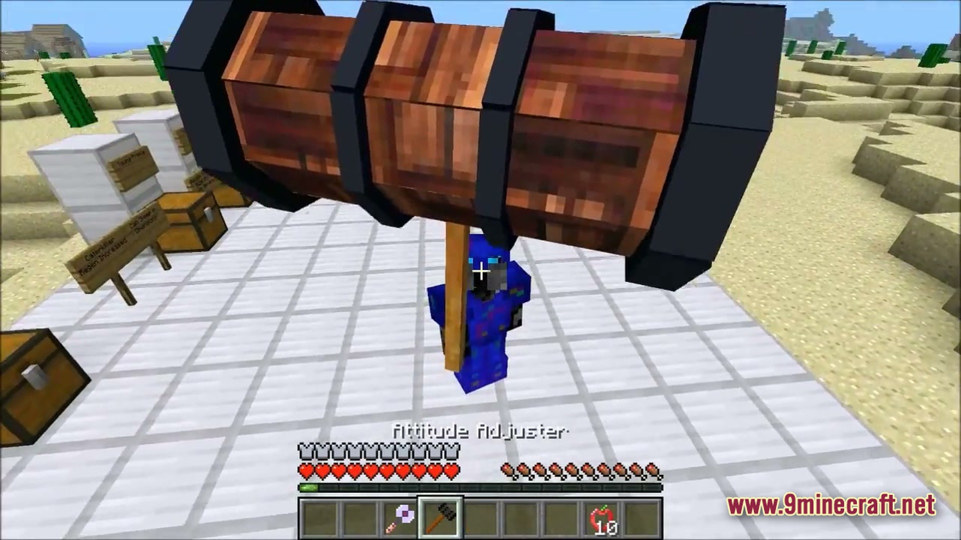 Ore Spawn Adventuree Modpack (1.20.1) – Crazy Dimensions And Giant Beasts 3 A player in blue armor holds the attitude adjuster hammer weapon in a desert biome
