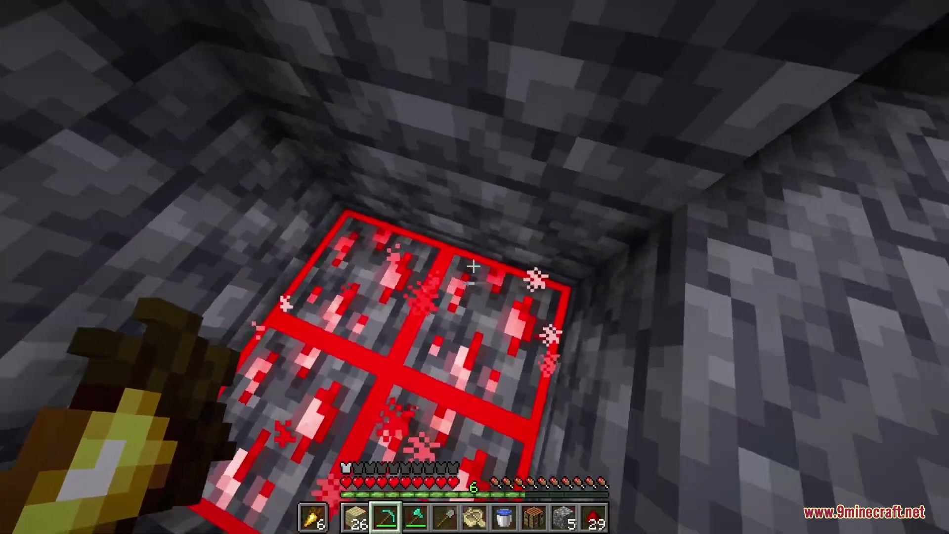 Pristine Vein Deposits Resource Pack (26.2, 1.20.1) – Bright Ore Borders 5 A player looks down at redstone ore blocks with distinct red borders