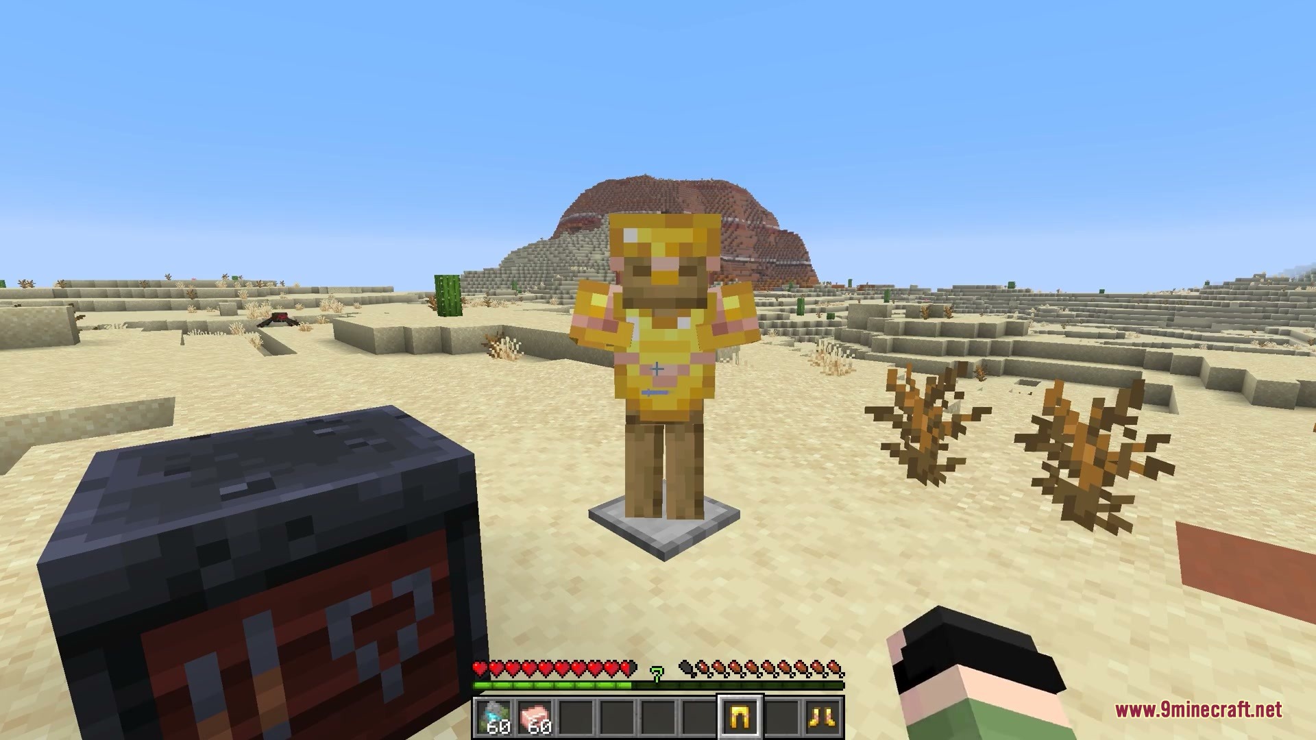 Radiant Veneer Mod (26.2, 1.21.1) – Light Up The Night With Glowing Armor Trims 4 Golden armor with glowing trims displayed on an armor stand in the desert