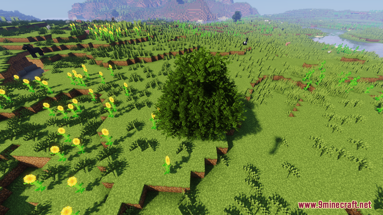 Rainbow’s Foliage Resource Pack (26.2, 1.20.1) – Bushier Leaves For Natural Forests 2 Rainbow foliage resource pack makes trees look bushier in a sunflower field