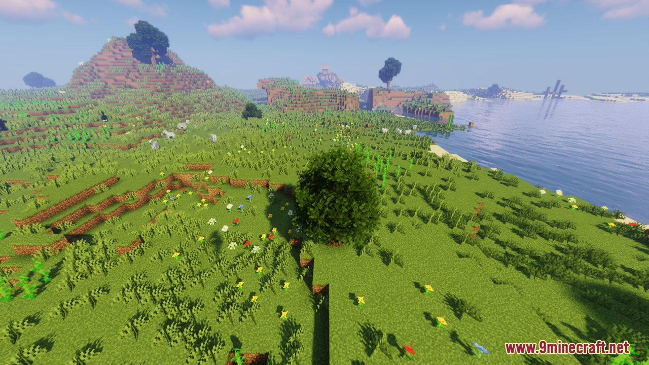 Rainbow’s Foliage Resource Pack (26.2, 1.20.1) – Bushier Leaves For Natural Forests 8 A large bushy tree stands in a green minecraft field next to a lake