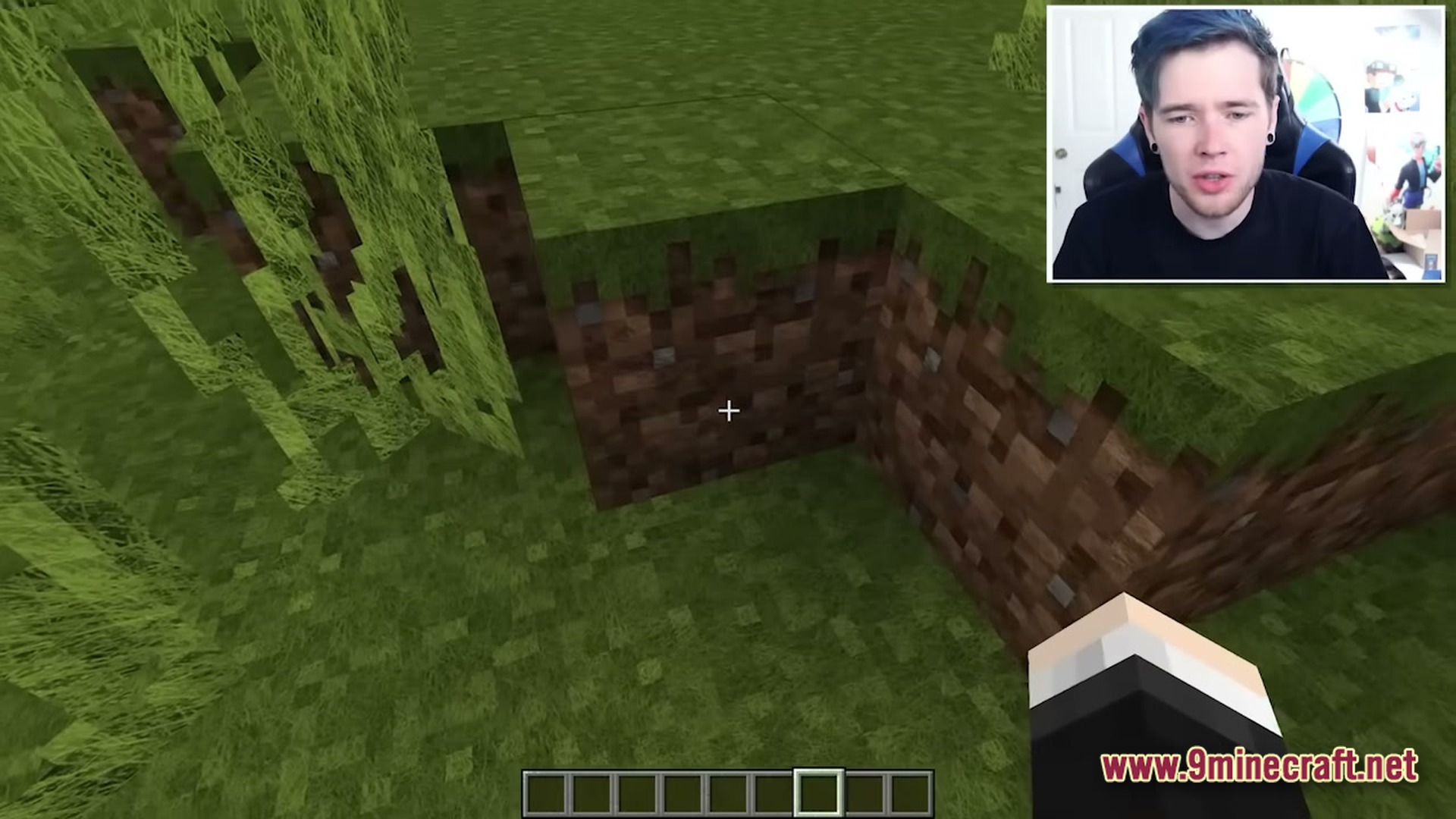 Real Realistic World Realistic Modpack (1.20.1) – Explore Lifelike Forests And Mountains 3 A first-person view of grass and dirt blocks with a facecam overlay of a youtuber