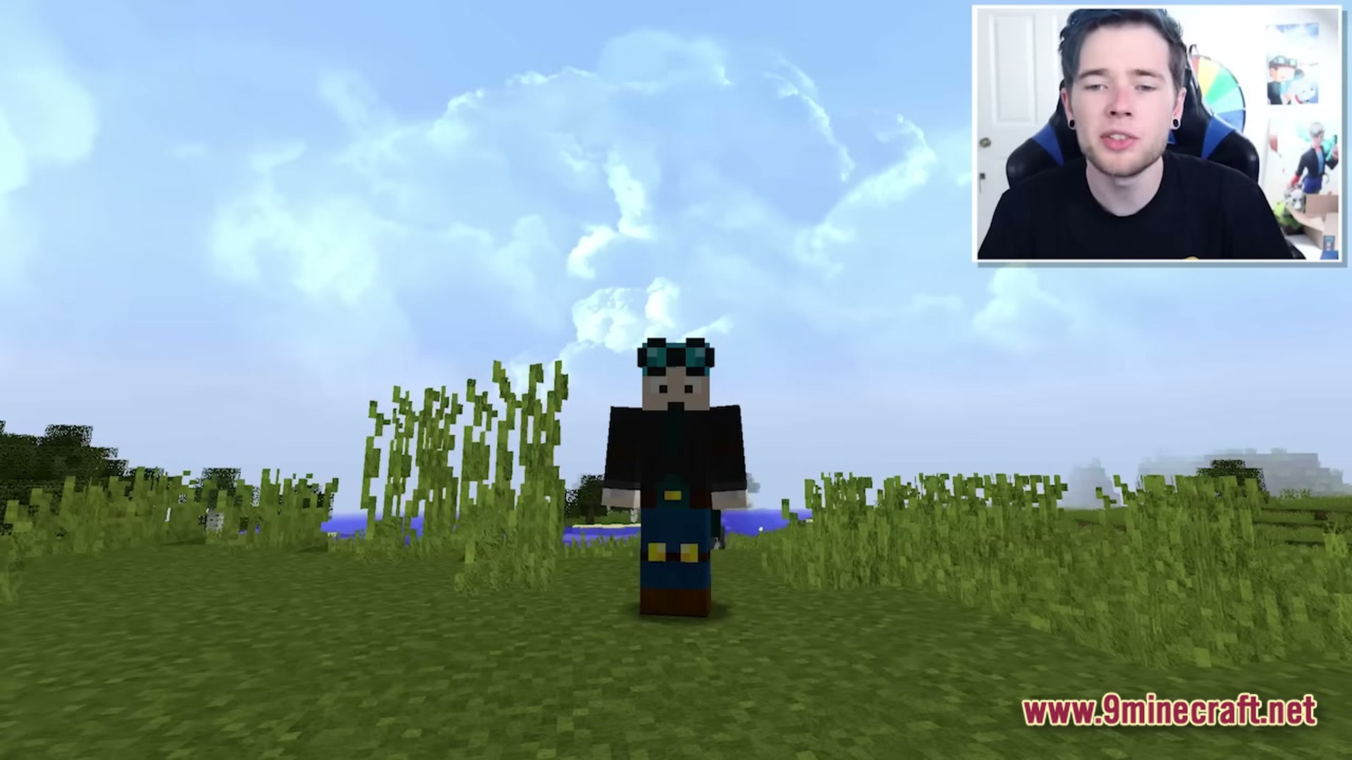 Real Realistic World Realistic Modpack (1.20.1) – Explore Lifelike Forests And Mountains 4 A player character stands in a grassy field under a realistic sky with volumetric clouds