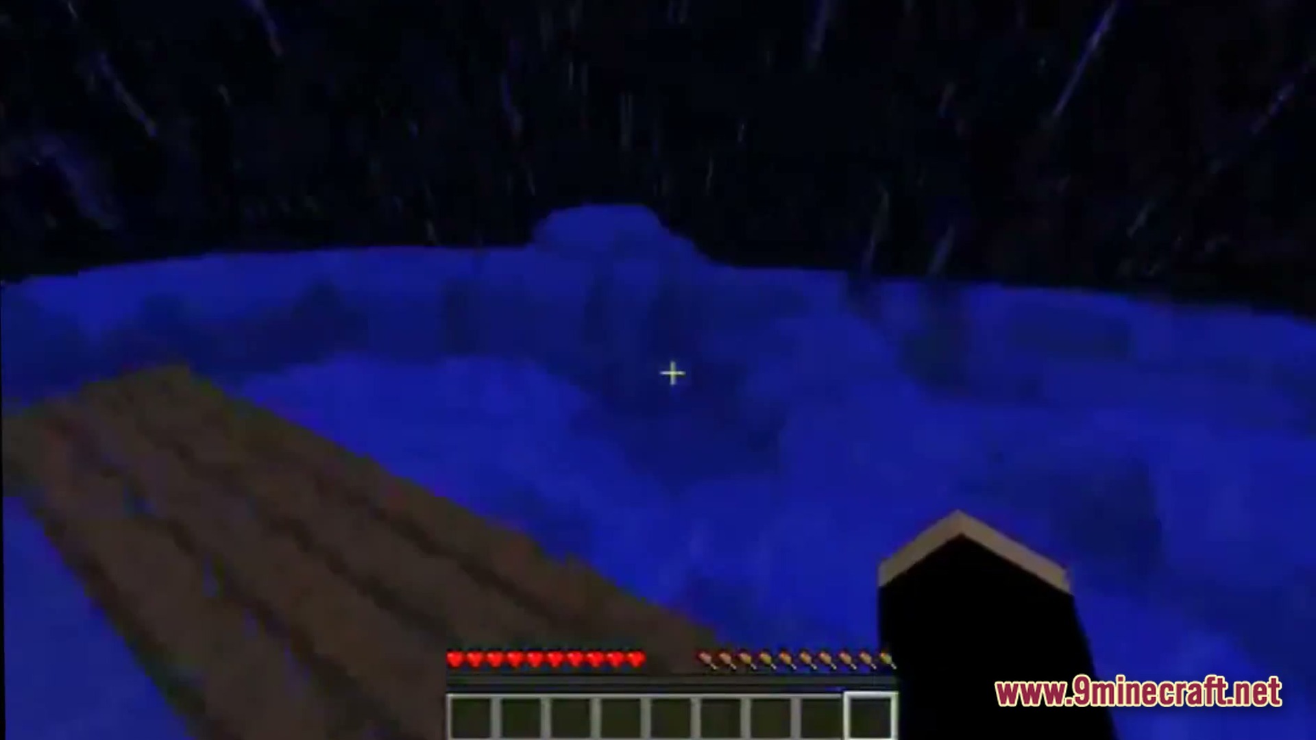 Saltwater Chronicles Modpack (1.21.1) – Explore Oceans And Defeat Monsters 6 A player stands on a wooden platform amidst a dark, rainy ocean at night
