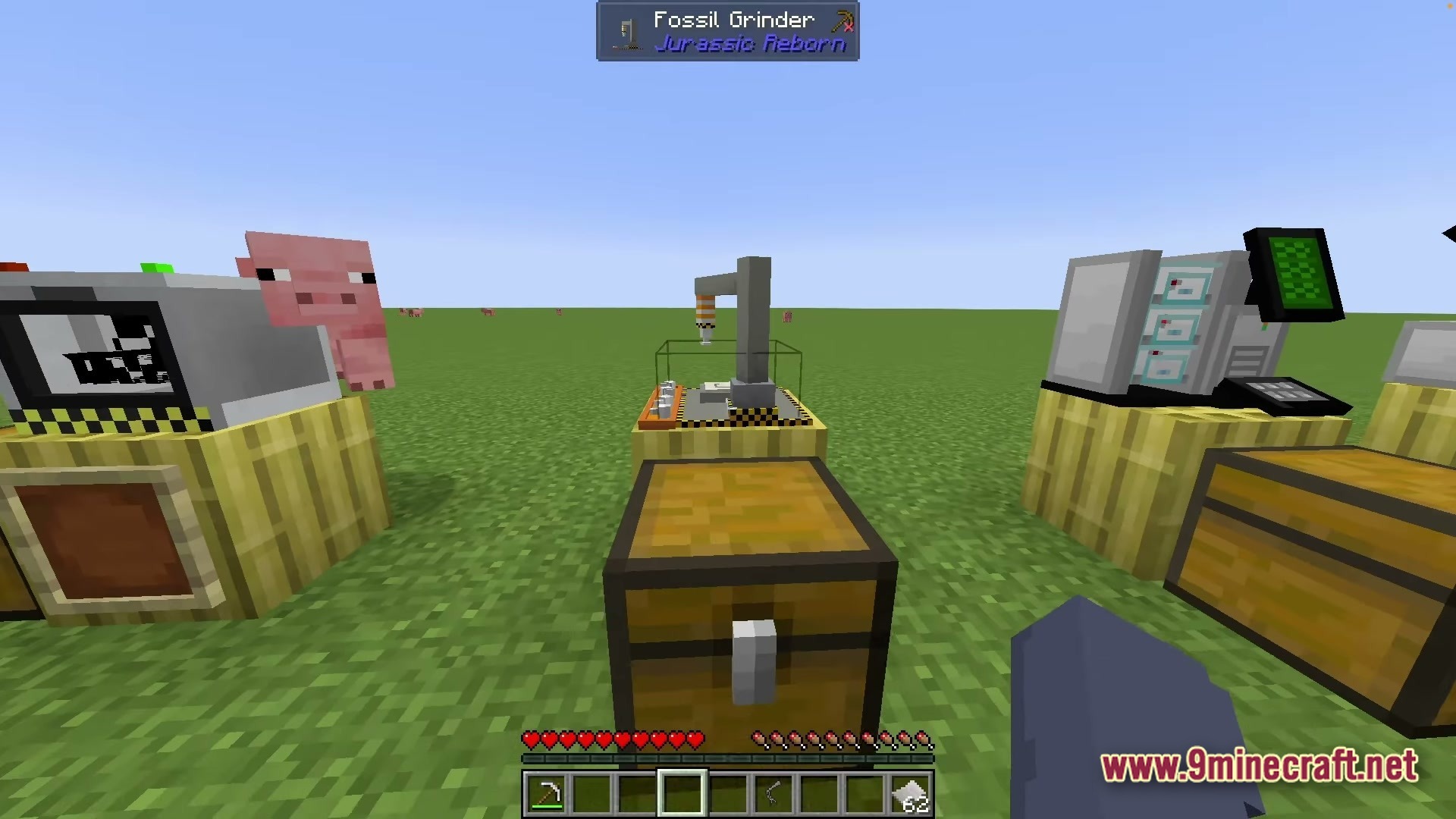 A fossil grinder and other laboratory machines from the jurassic reborn mod in a flat world