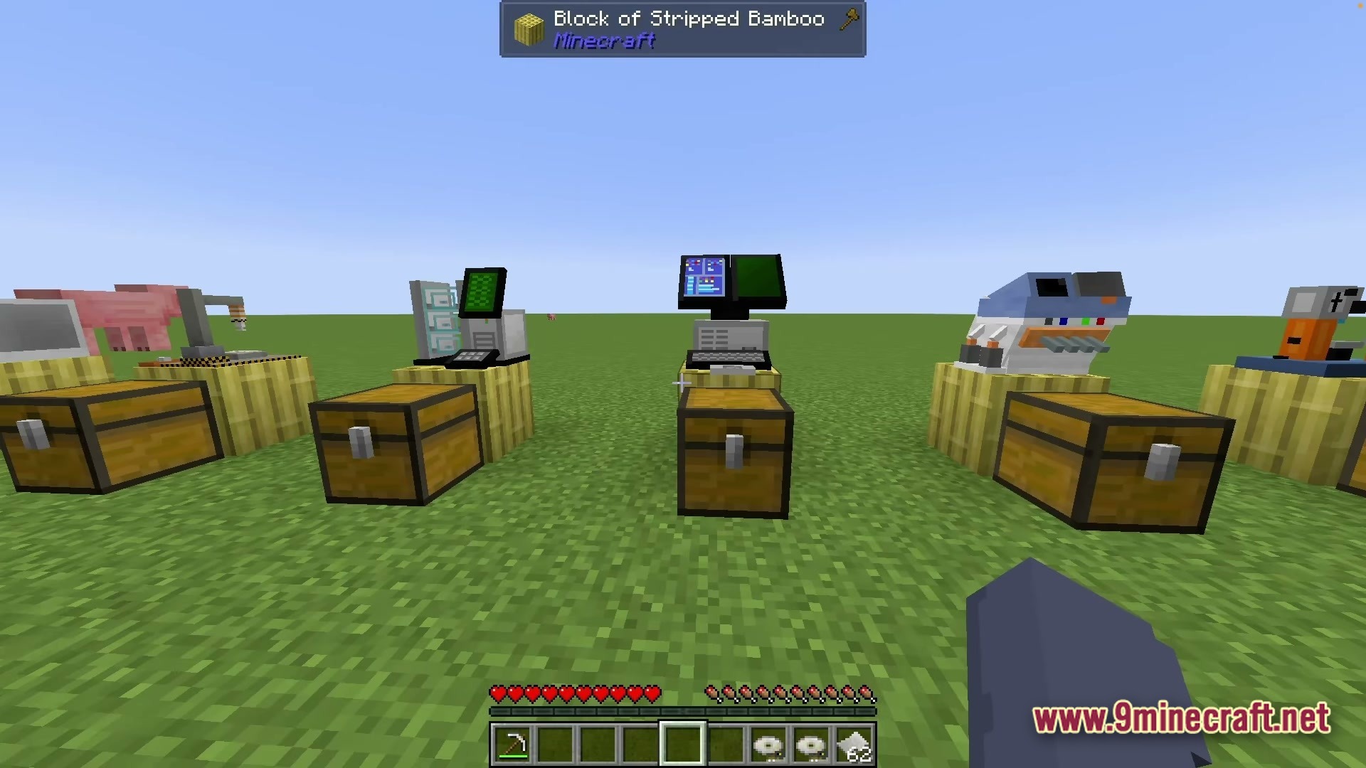 Various scientific laboratory machines and computers placed on bamboo blocks next to wooden chests