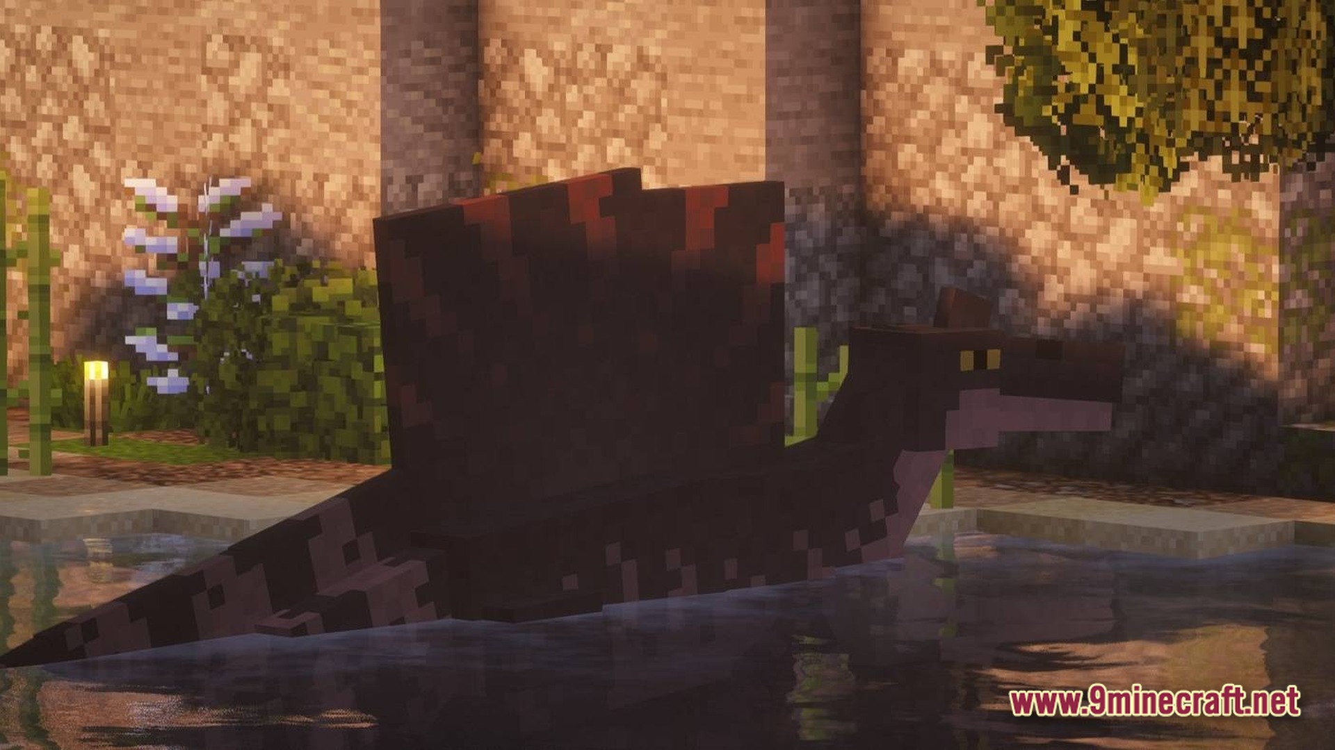 A spinosaurus swimming in a pond next to a stone wall and lush green foliage