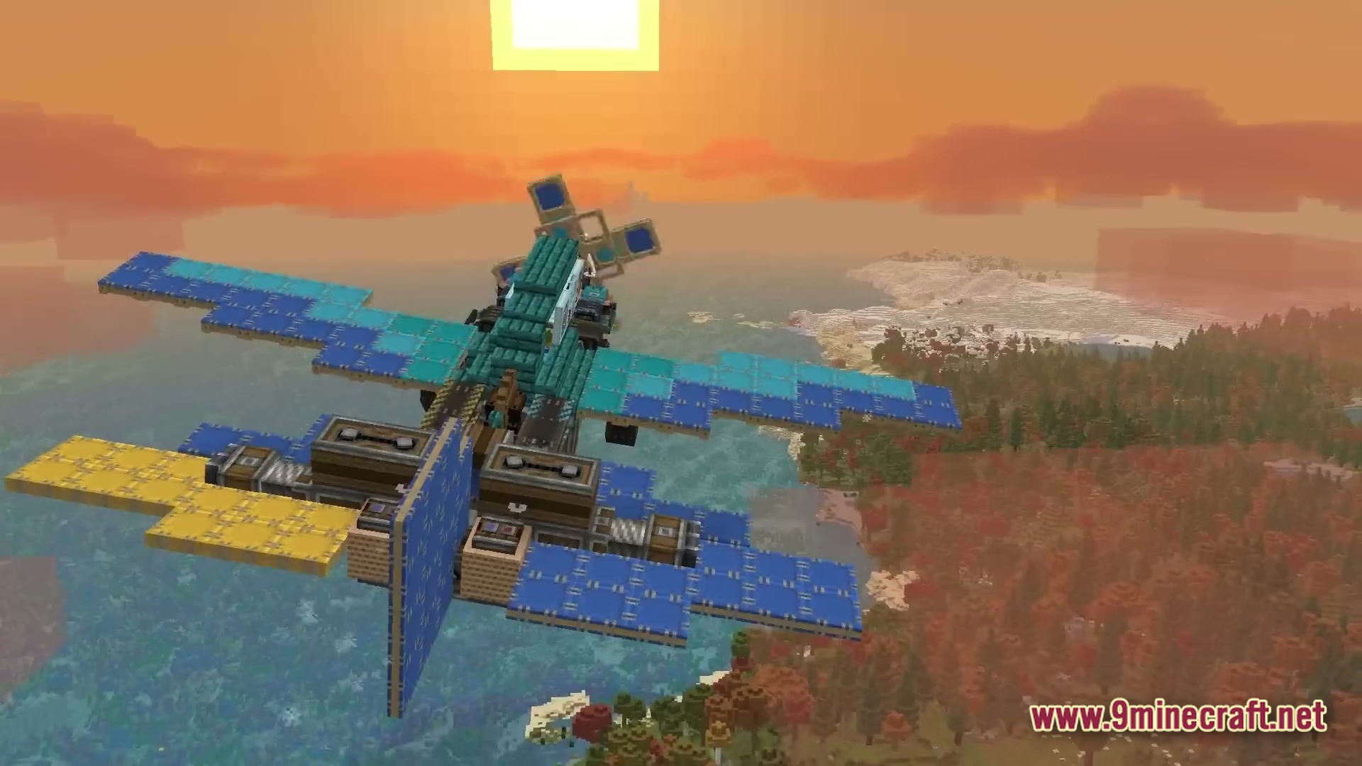 Skybound Engineering Alpha Modpack (1.21.1) – Build And Fly Moving Machines 7 A custom-built blue and teal aircraft flies over a diverse landscape during a sunset