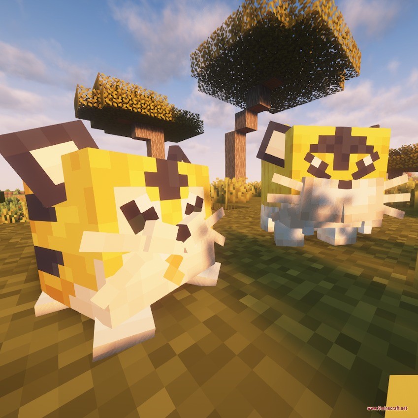 Spaceworld Mons Data Pack (1.21.1, 1.20.1) – Catch And Train Forgotten 6 Two yellow tiger creatures from spaceworld mons data pack standing in a savanna